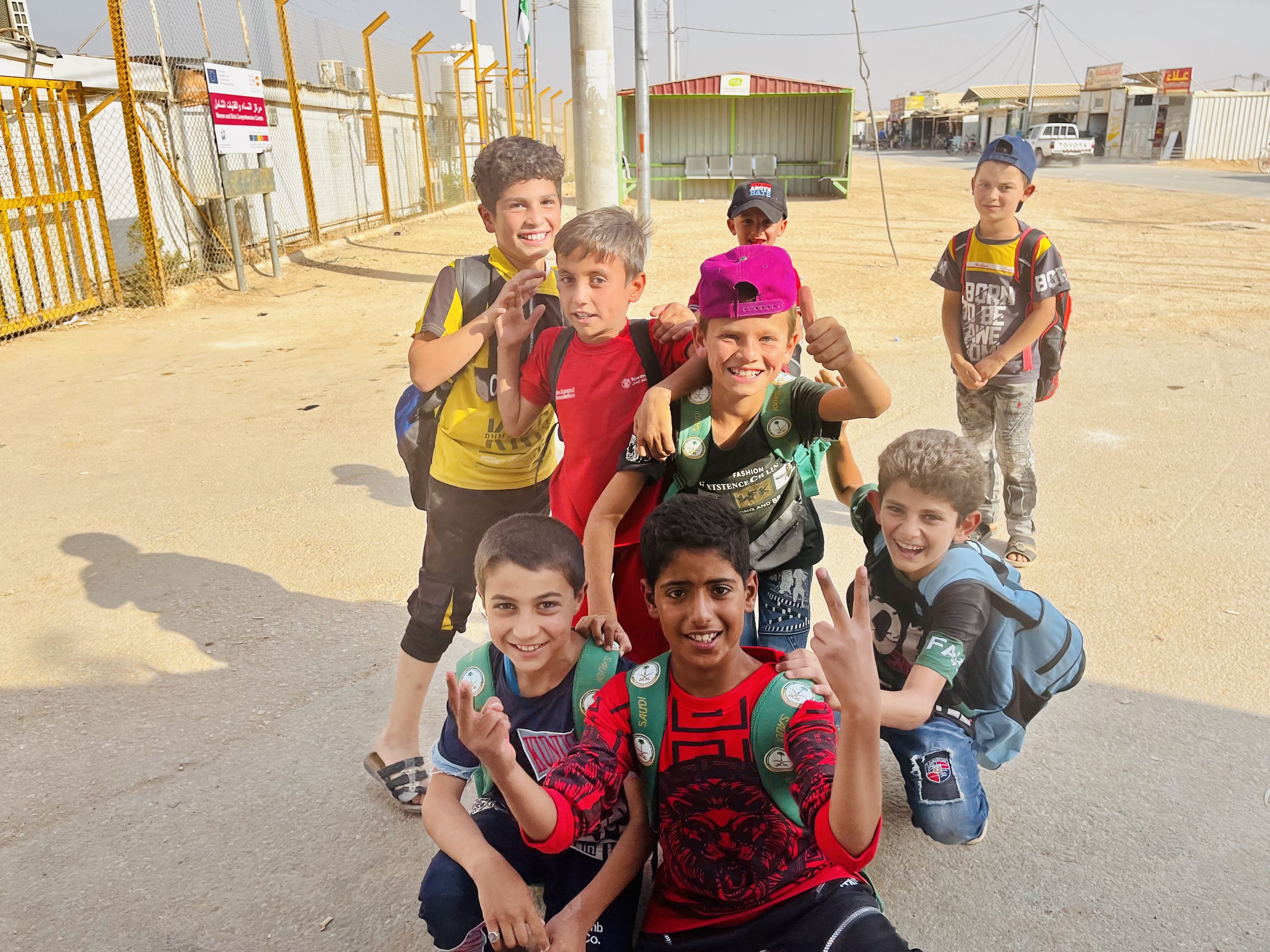 Syrian boys pose for a photo after school