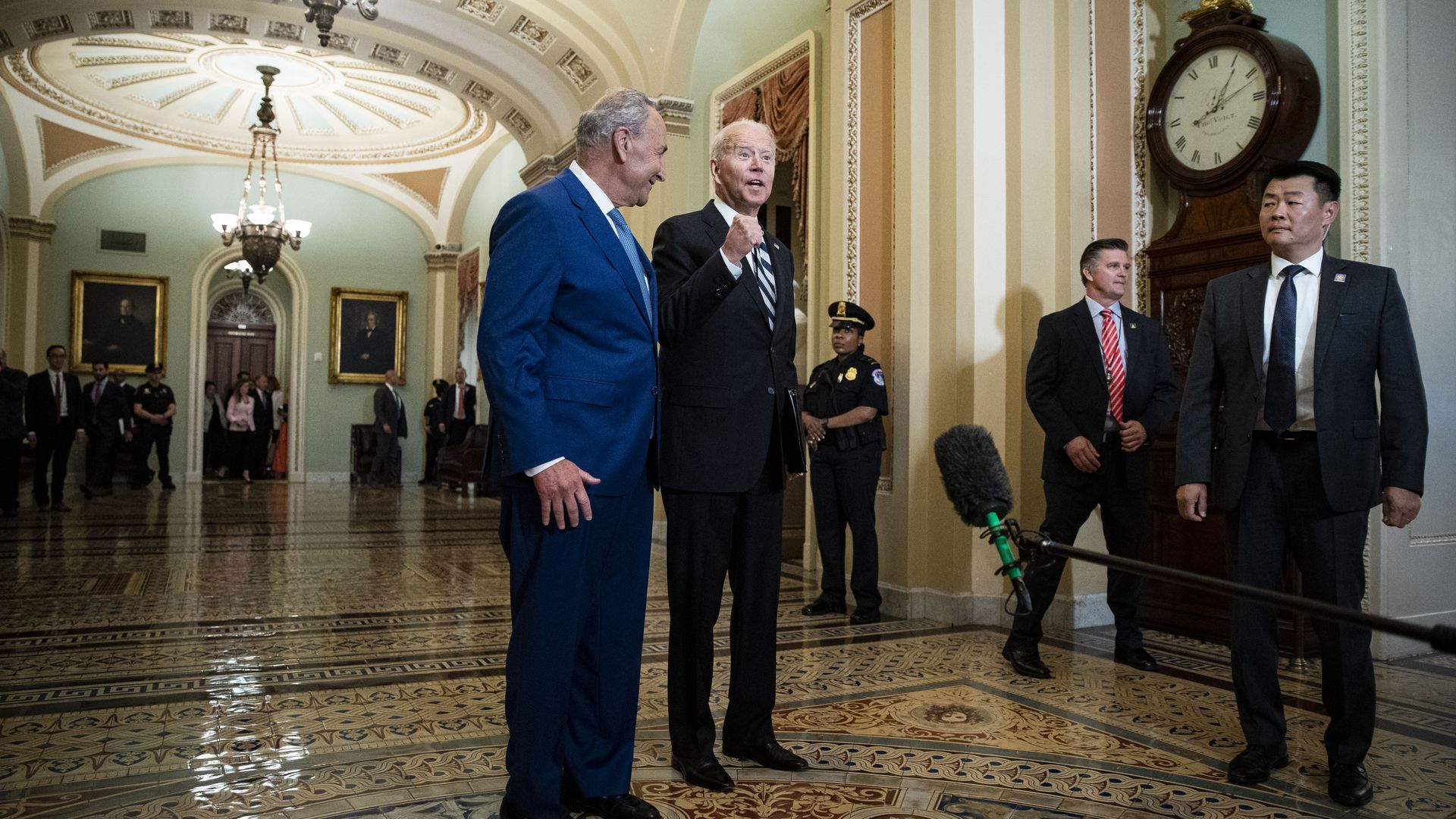 President Biden is seen standing next to the Ohio Clock as he returned to the Capitol to meet with Senate Democrats.