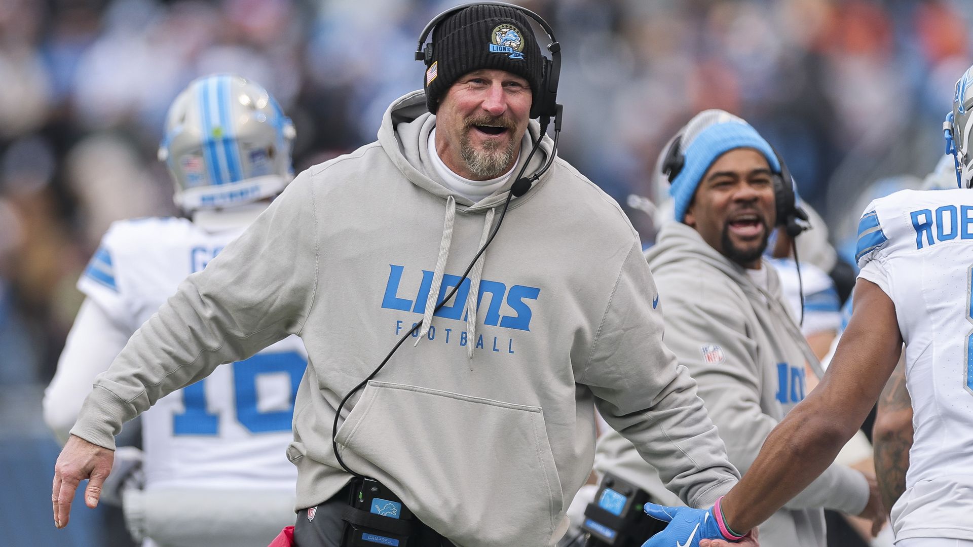 Lions coach Dan Campbell celebrates against the Bears last season. 