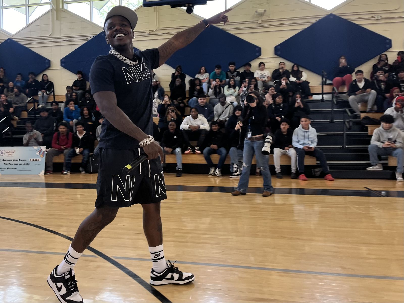 DaBaby surprises Charlotte high school students with performance and music  festival tickets - Axios Charlotte