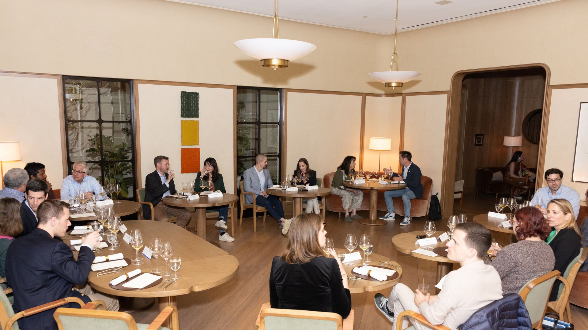 Attendees enjoyed dinner during the intimate roundtable discussion. Credit: Chris Constantine for Axios