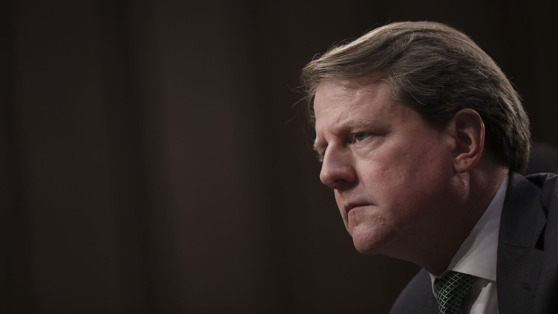 In this image, Don McGahn looks to the left.