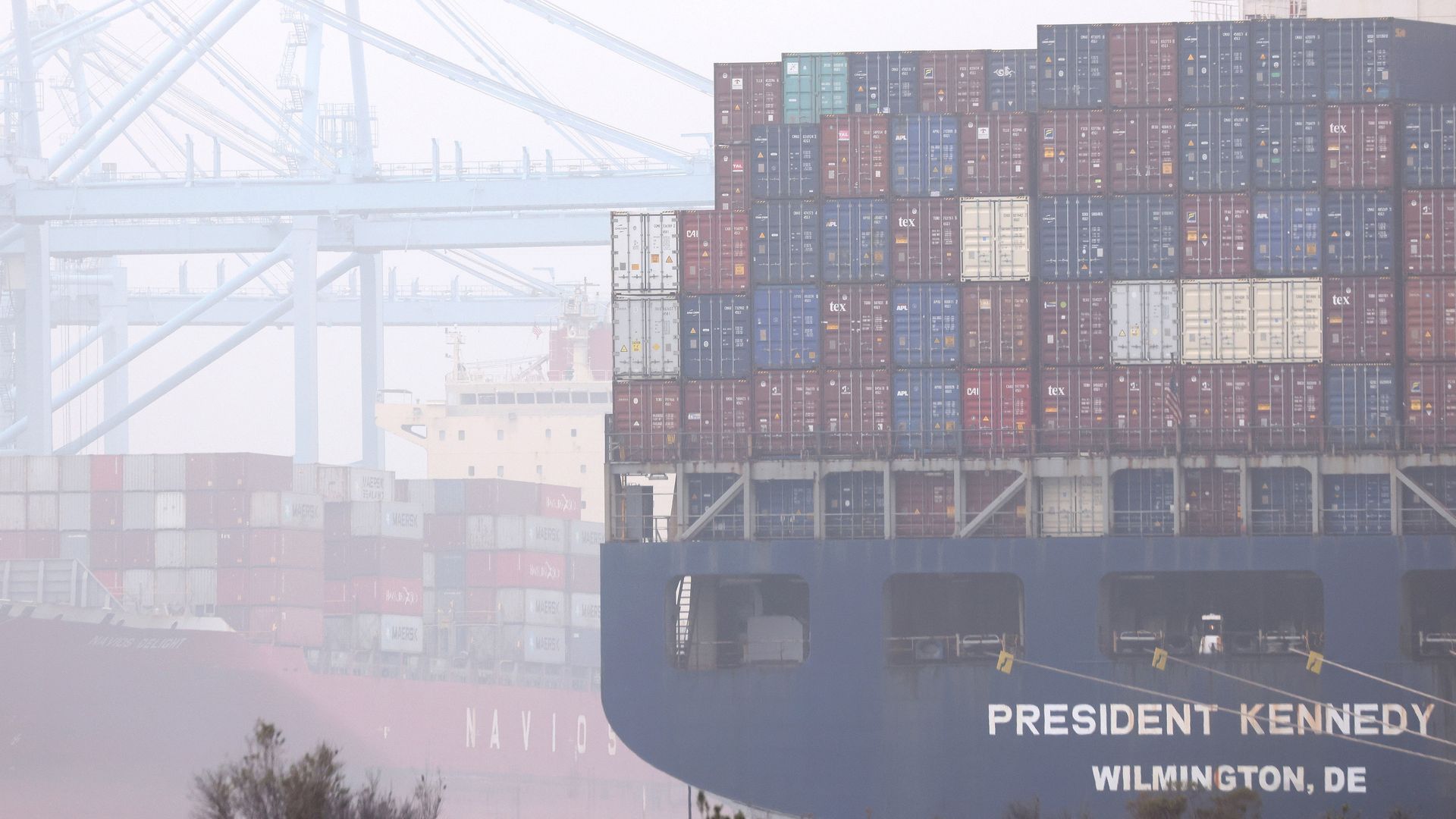 Shipping containers are stacked on the President Kennedy container ship at the Port of Los Angeles