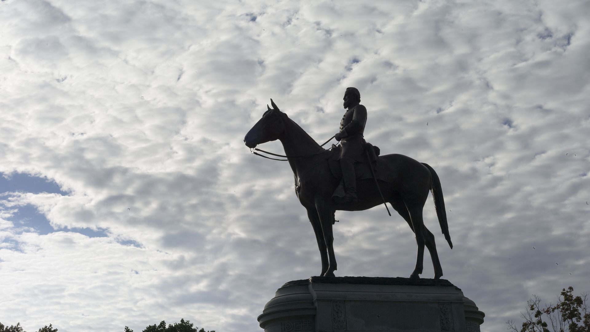 A statue of Confederate general Stonewall Jackson towers over Monument Avenue