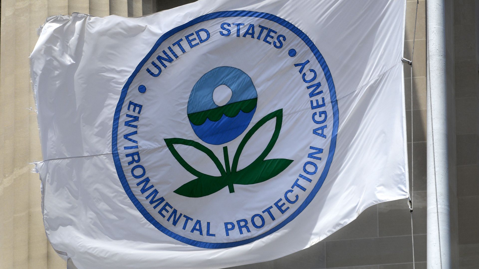 A flag with the United States Environmental Protection Agency (EPA) logo flies at the agency's headquarters in Washington, D.C.