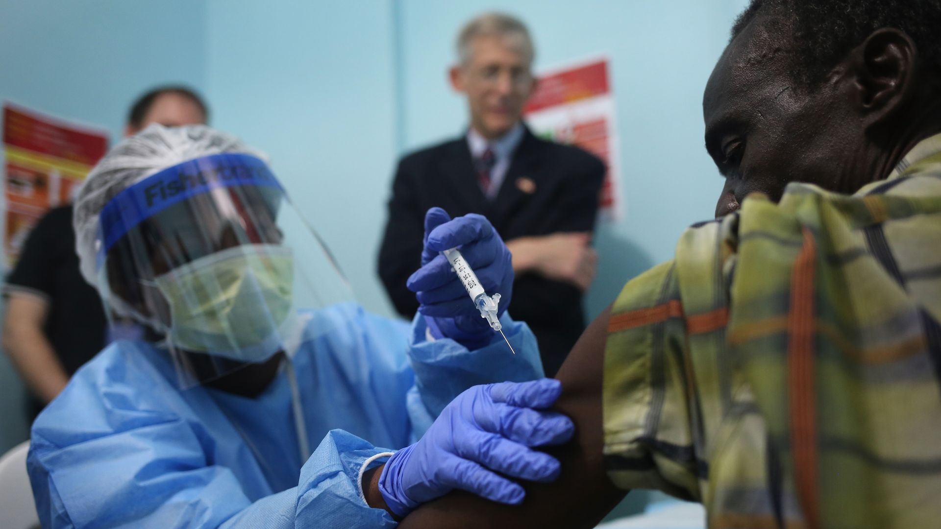 A nurse administers an Ebola vaccine in Monrovia, Liberia on February 2, 2015 as part of a clinical research study conducted by the National Institutes of Health and the Liberian Ministry of Health.  
