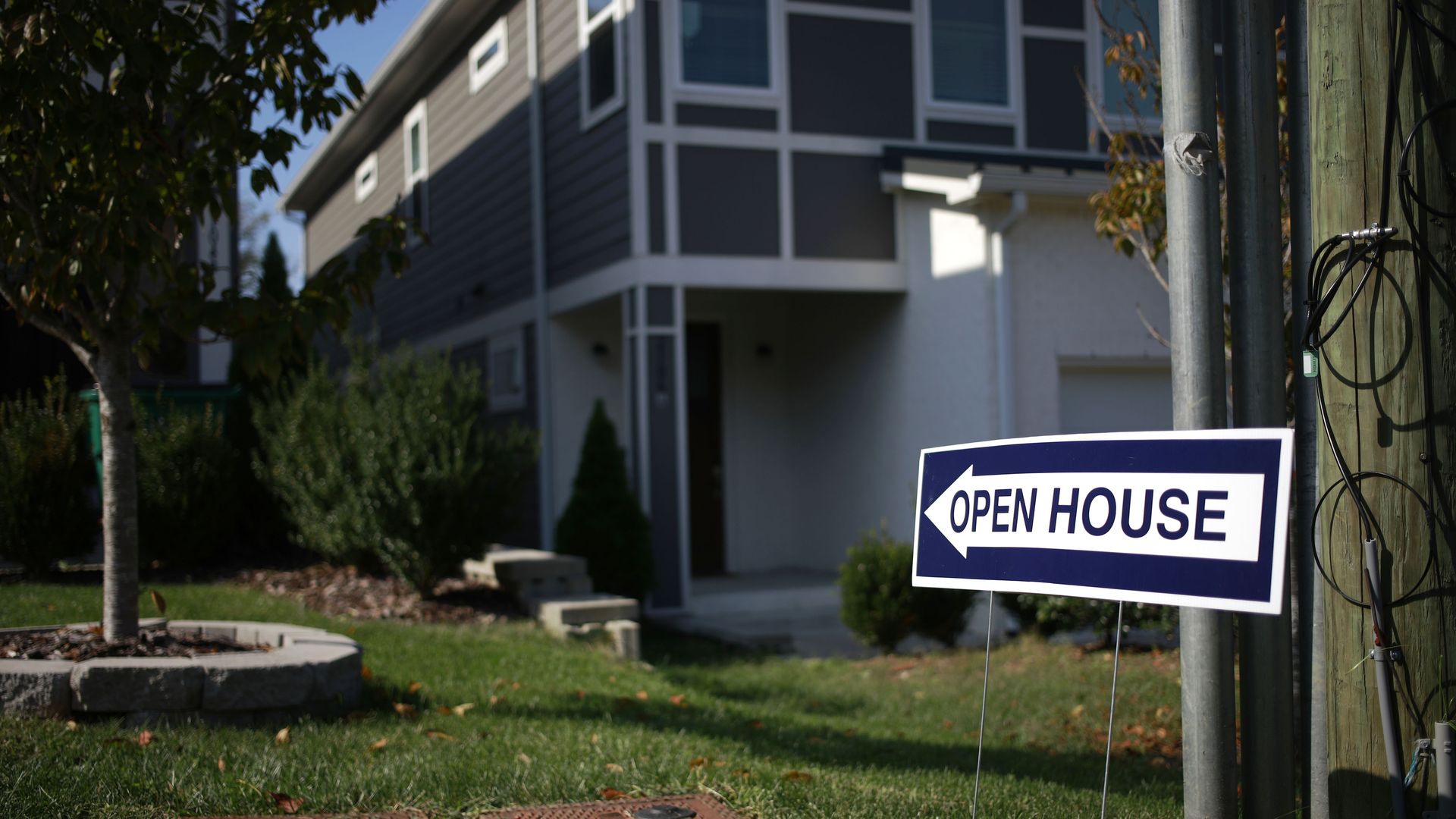 n "Open House" sign outside a home in Nashville, Tennessee, U.S., on Sunday, Oct. 24, 2021