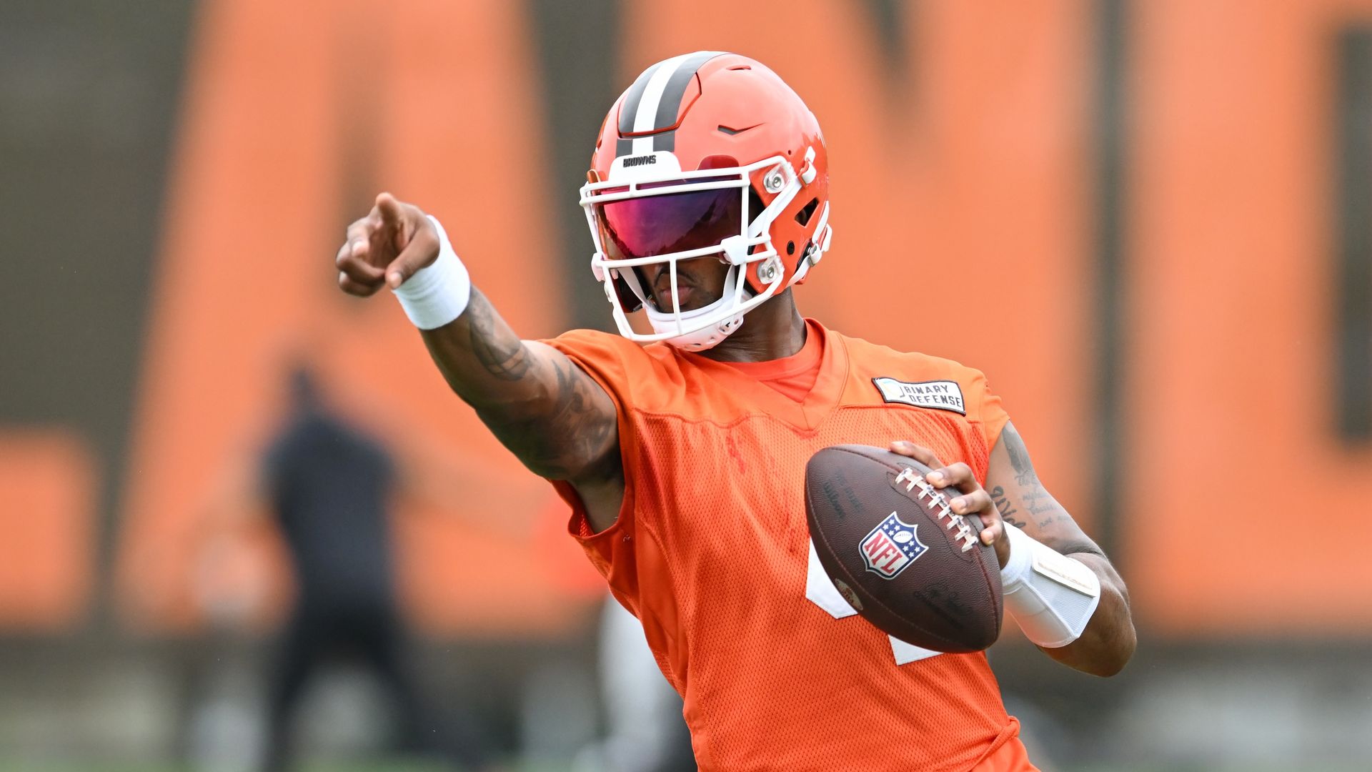 Browns quarterback Deshaun Watson points during practice at training camp.