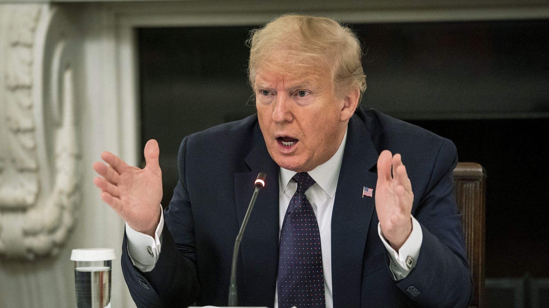 President Donald Trump speaks during a roundtable in the State Dining Room of the White House