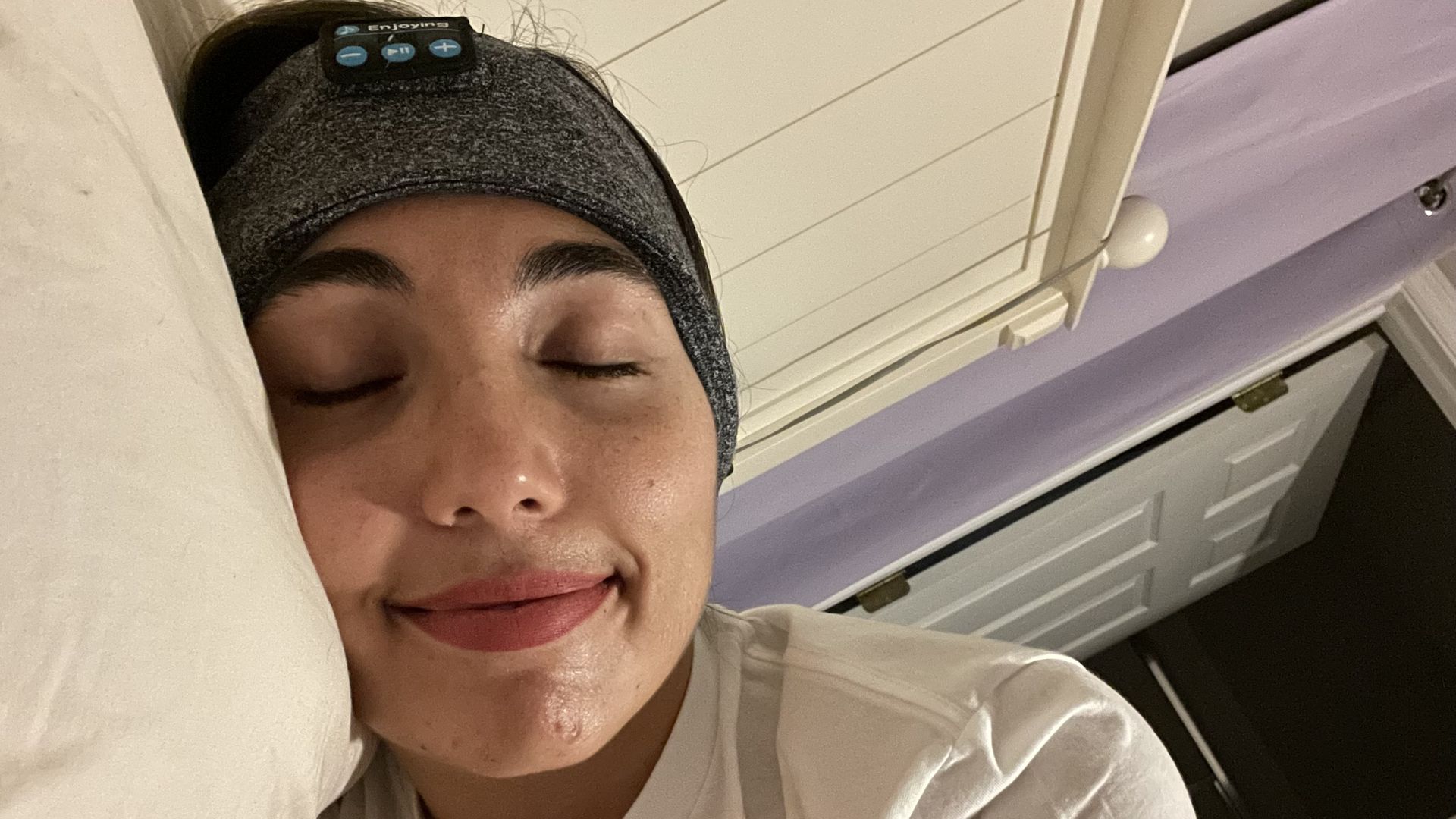 Selene wearing the sleep. headband