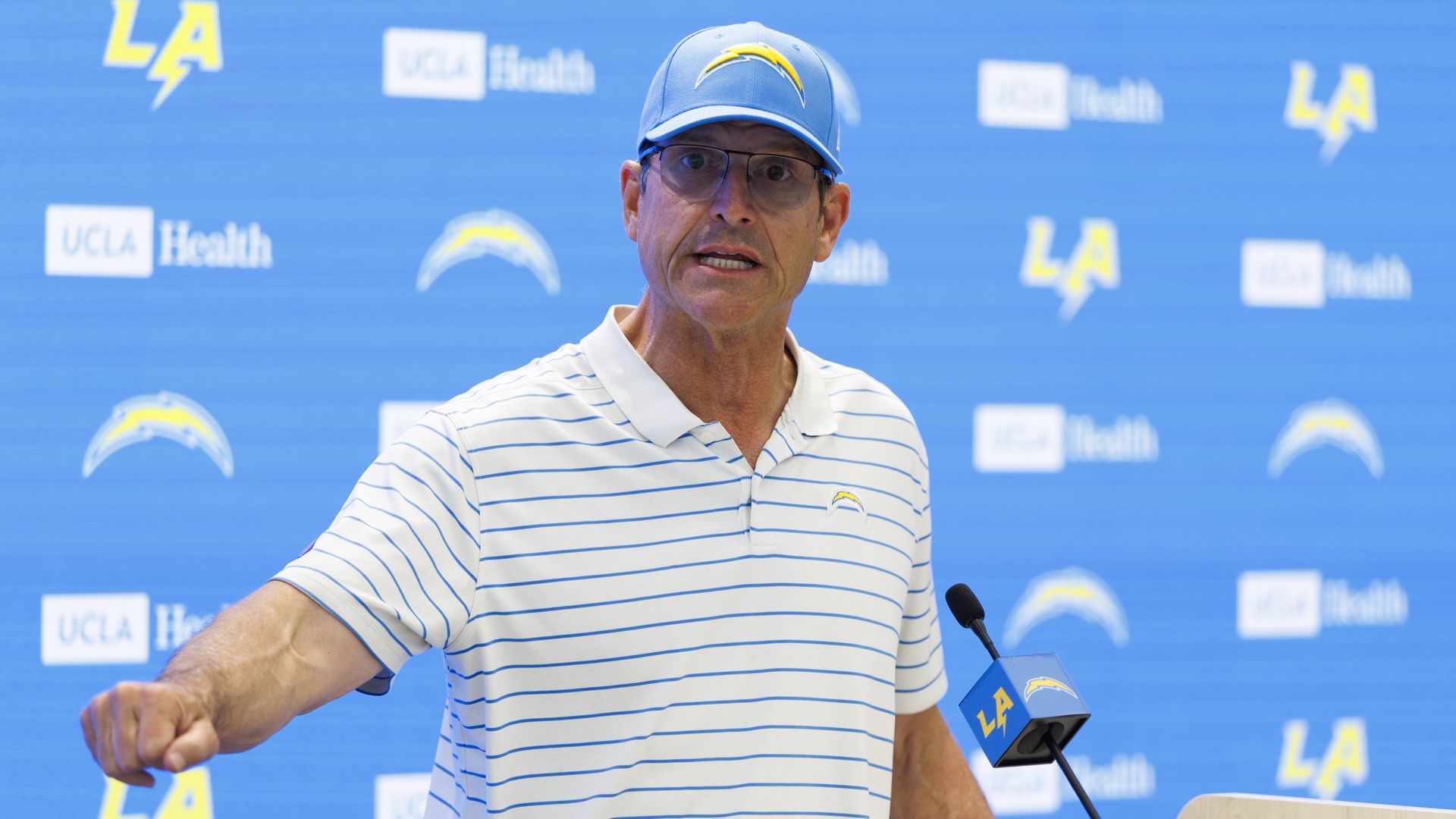 Jim Harbough during a press conference