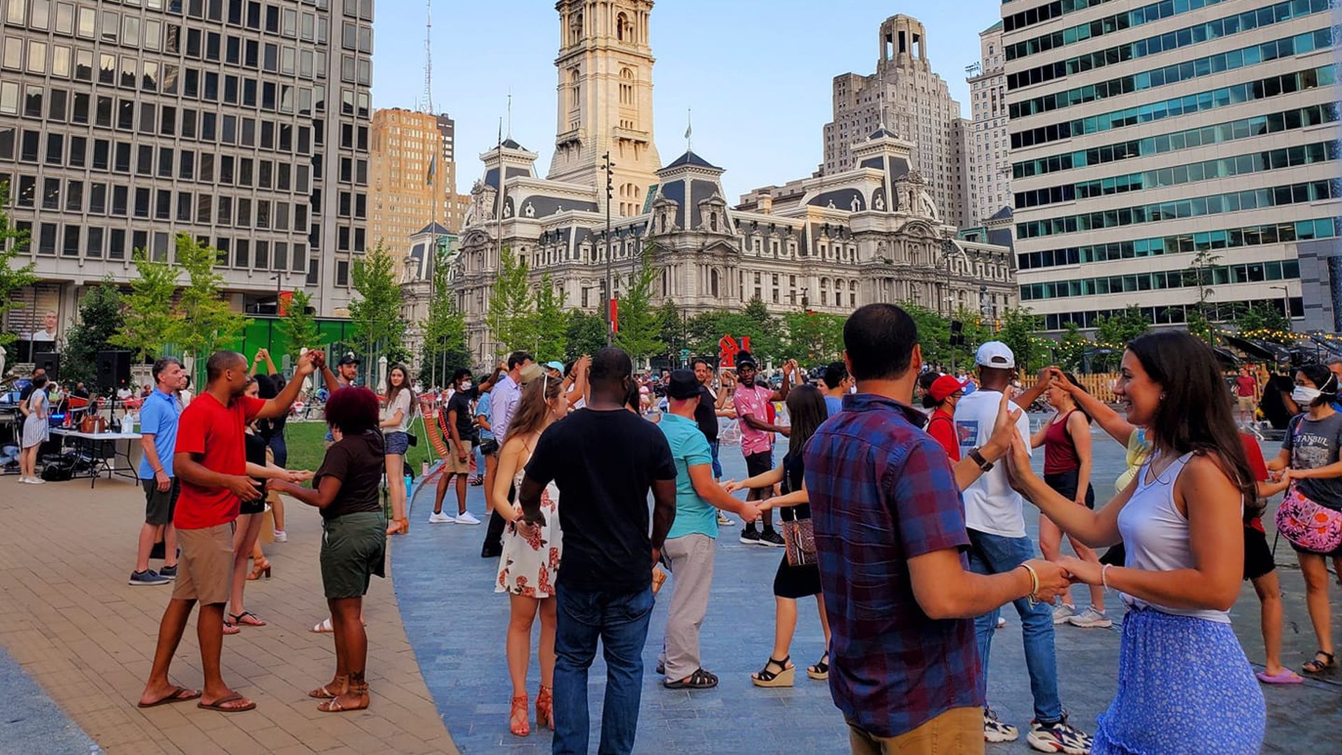 Dancers learn salsa in Philadelphia's Love Park.