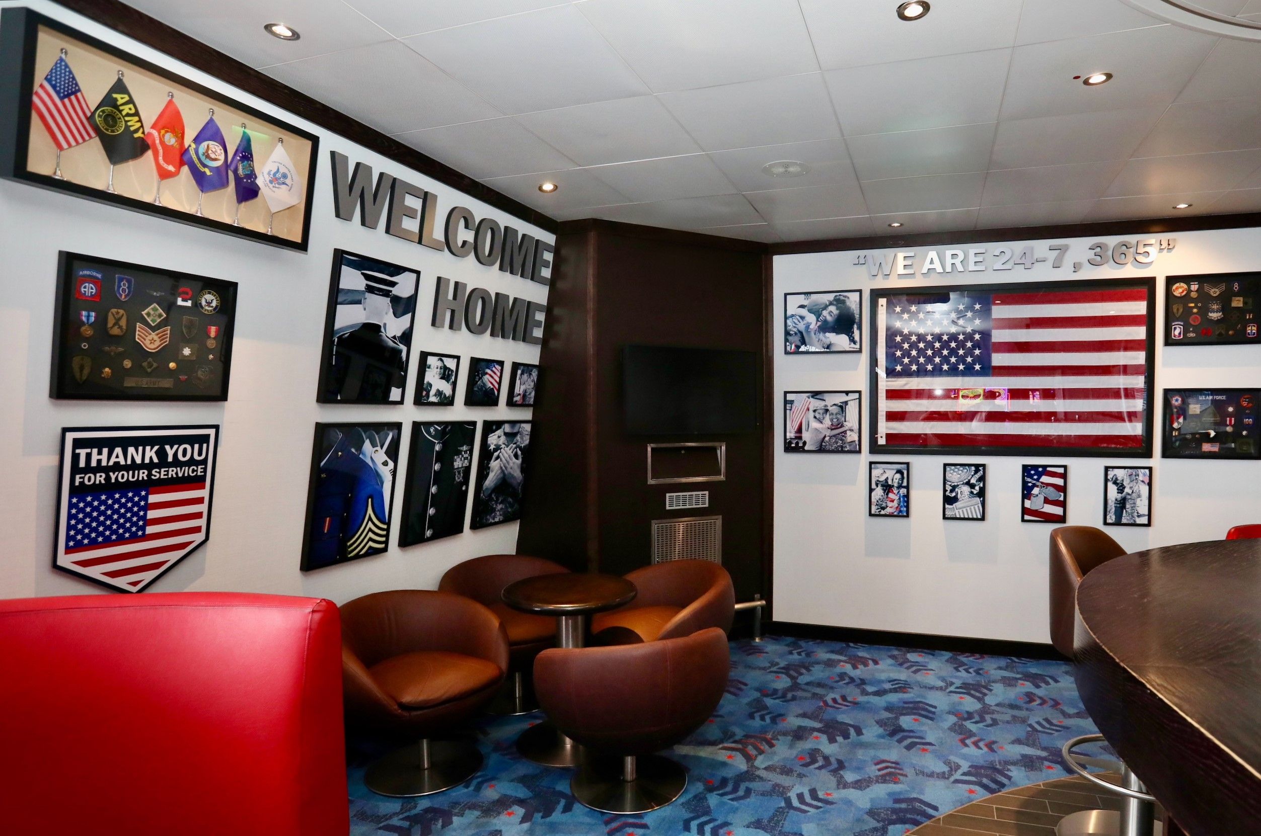 Image shows the inside of the Heroes Tribute Bar with an American flag on the wall.