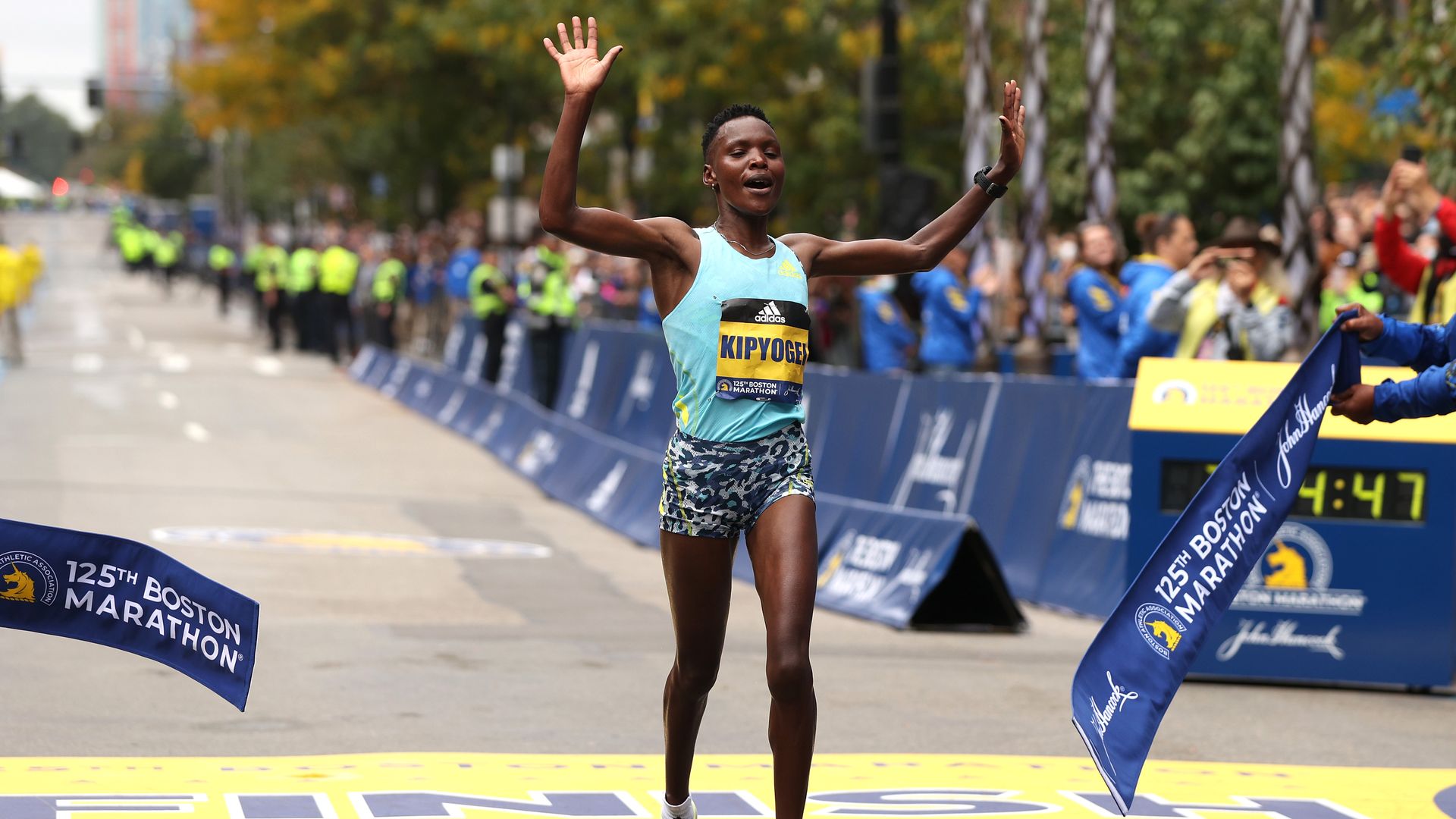 Diana Kipyogei of Kenya crosses the finish line to win the 125th Boston Marathon on October 11, 2021.