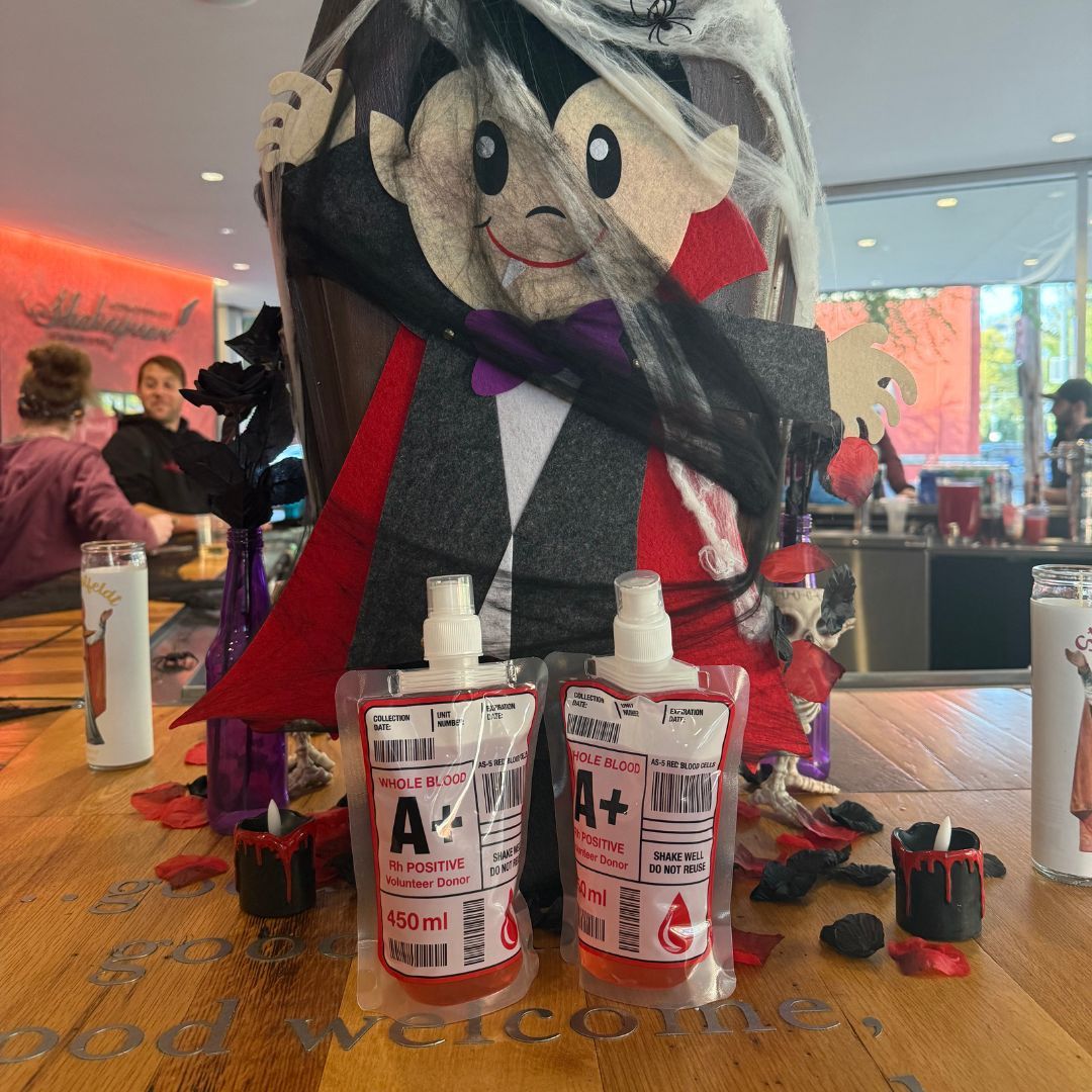 Blood bag cocktails with a little Dracula cutout behind it because we vants to suck your blood! 