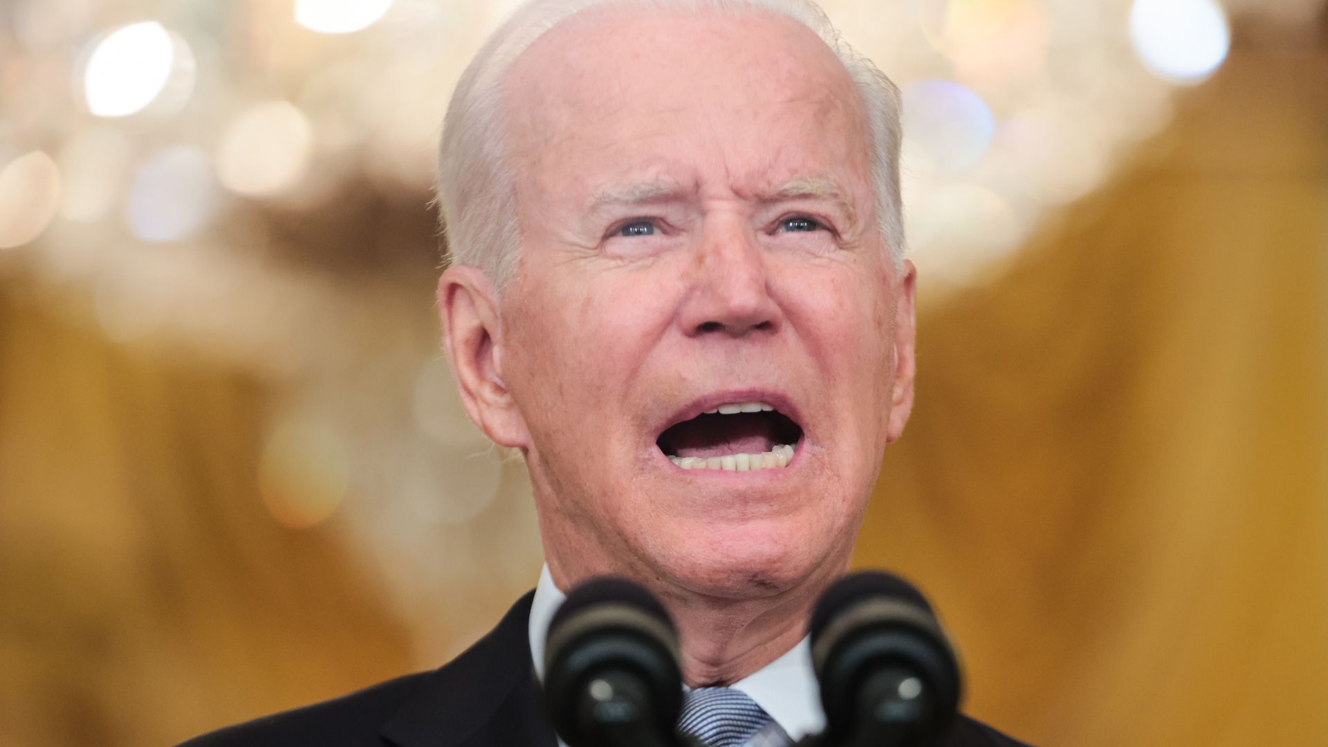 Close-up of President Biden's face with emotion as he speaks about the withdrawal from Afghanistan