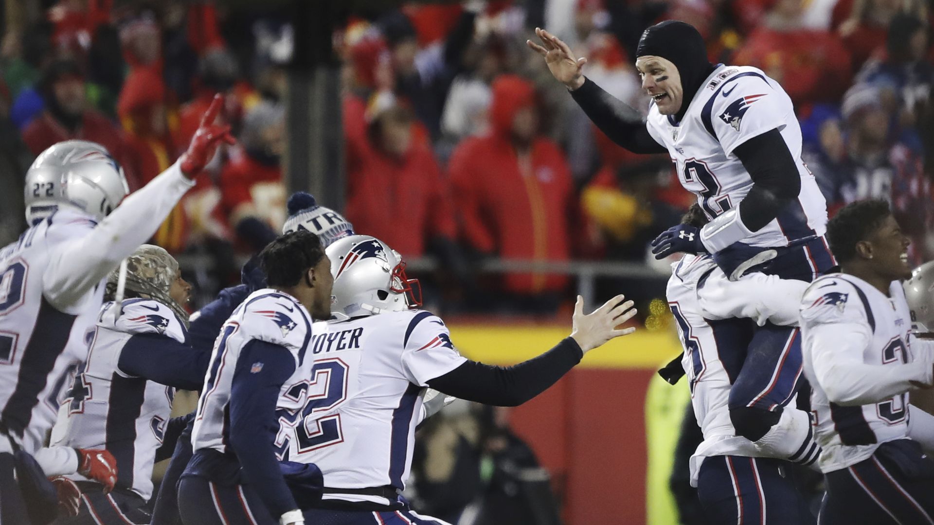 Brady celebrates with his teammates after the AFC Championship game on Jan 20.