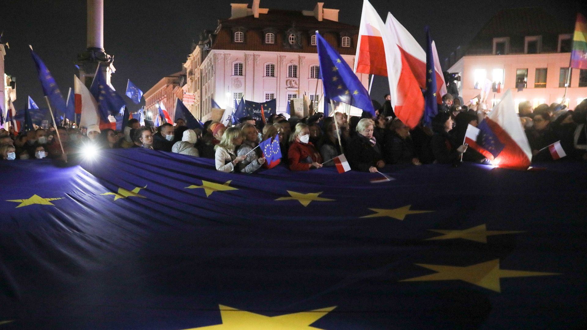 Pro Europe protesters gather at Plac Zamkowy, in Warsaw's Old Town