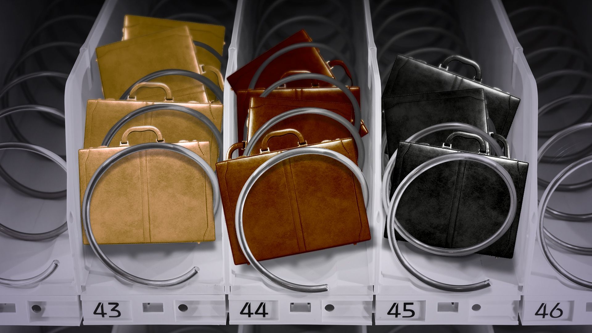 Close-up of briefcases in a vending machine.