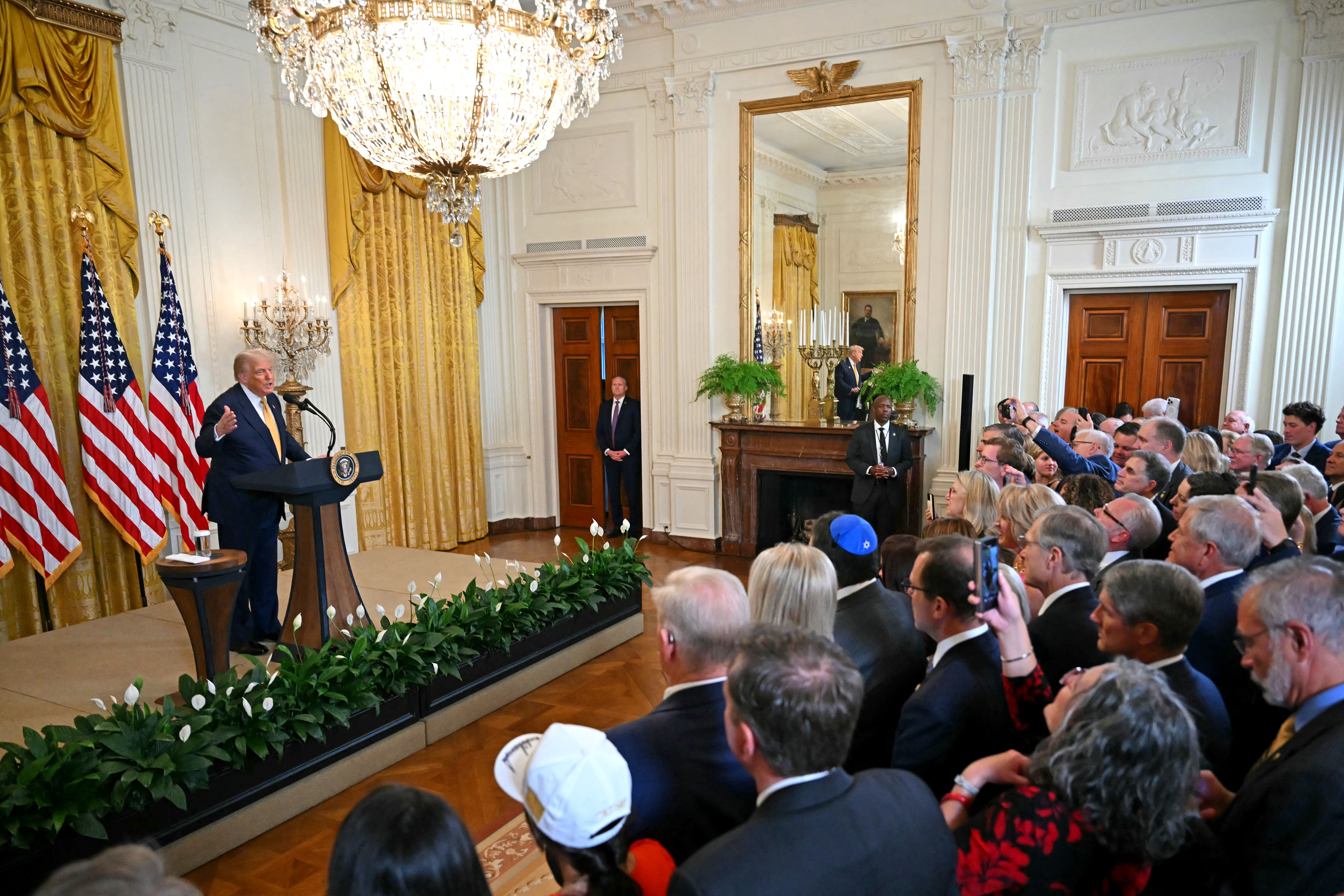 President Trump speaks to House Republicans in the East Room last night. 