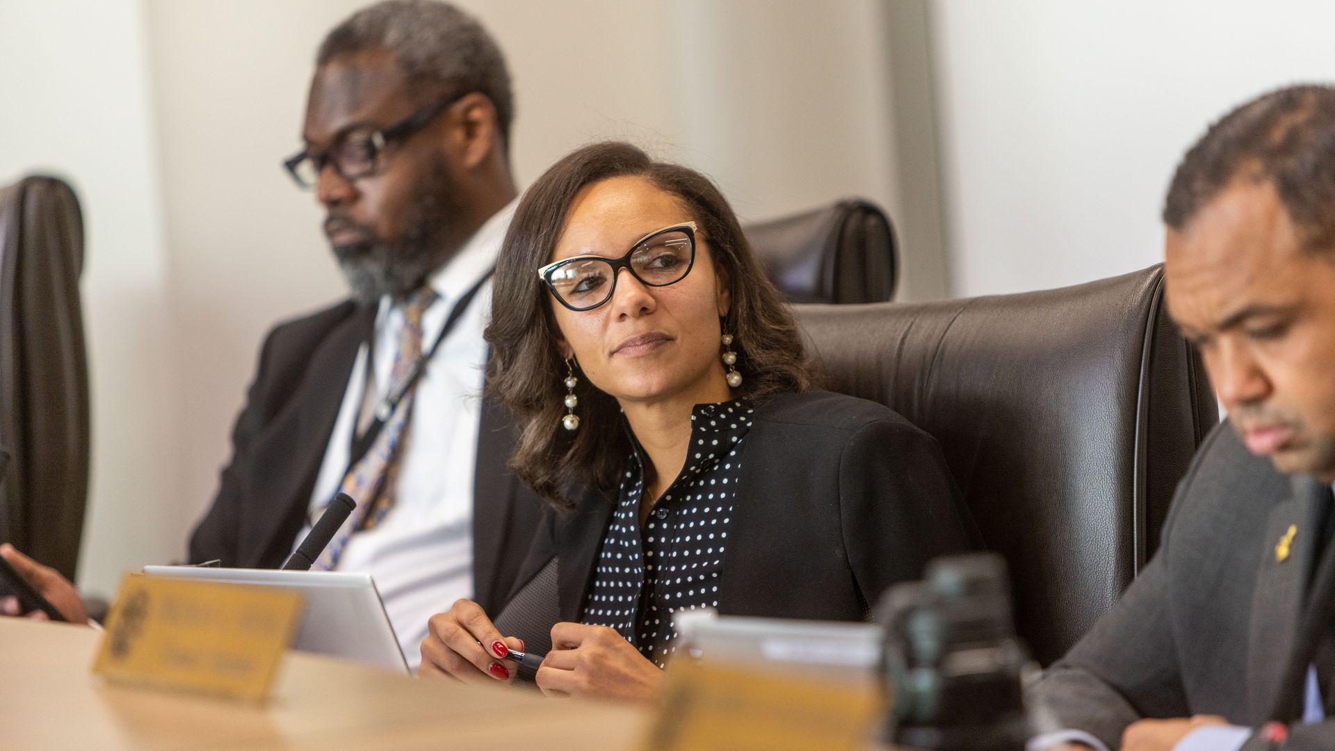 Detroit City Council president Mary Sheffield sits between President Pro-Tem James Tate and Coleman Young II.