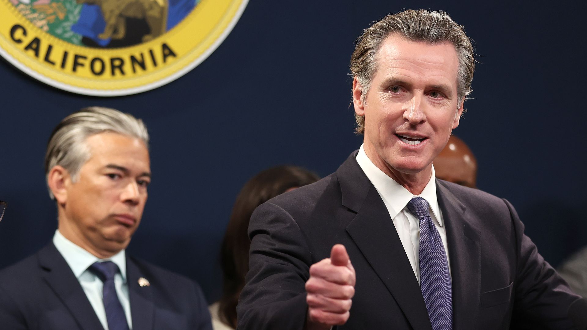 California Gov. Gavin Newsom (R) speaks as state Attorney General Rob Bonta (C) looks on during a press conference on February 01, 2023 in Sacramento, California. 