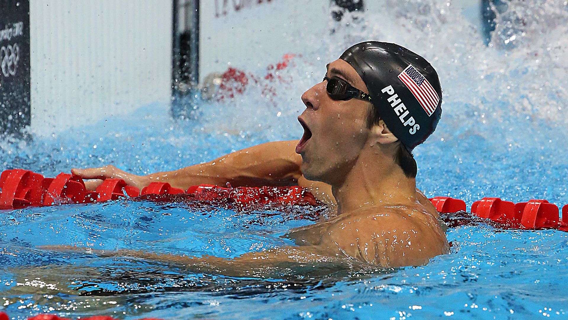 michael phelps celebrates winning gold medal in 2012