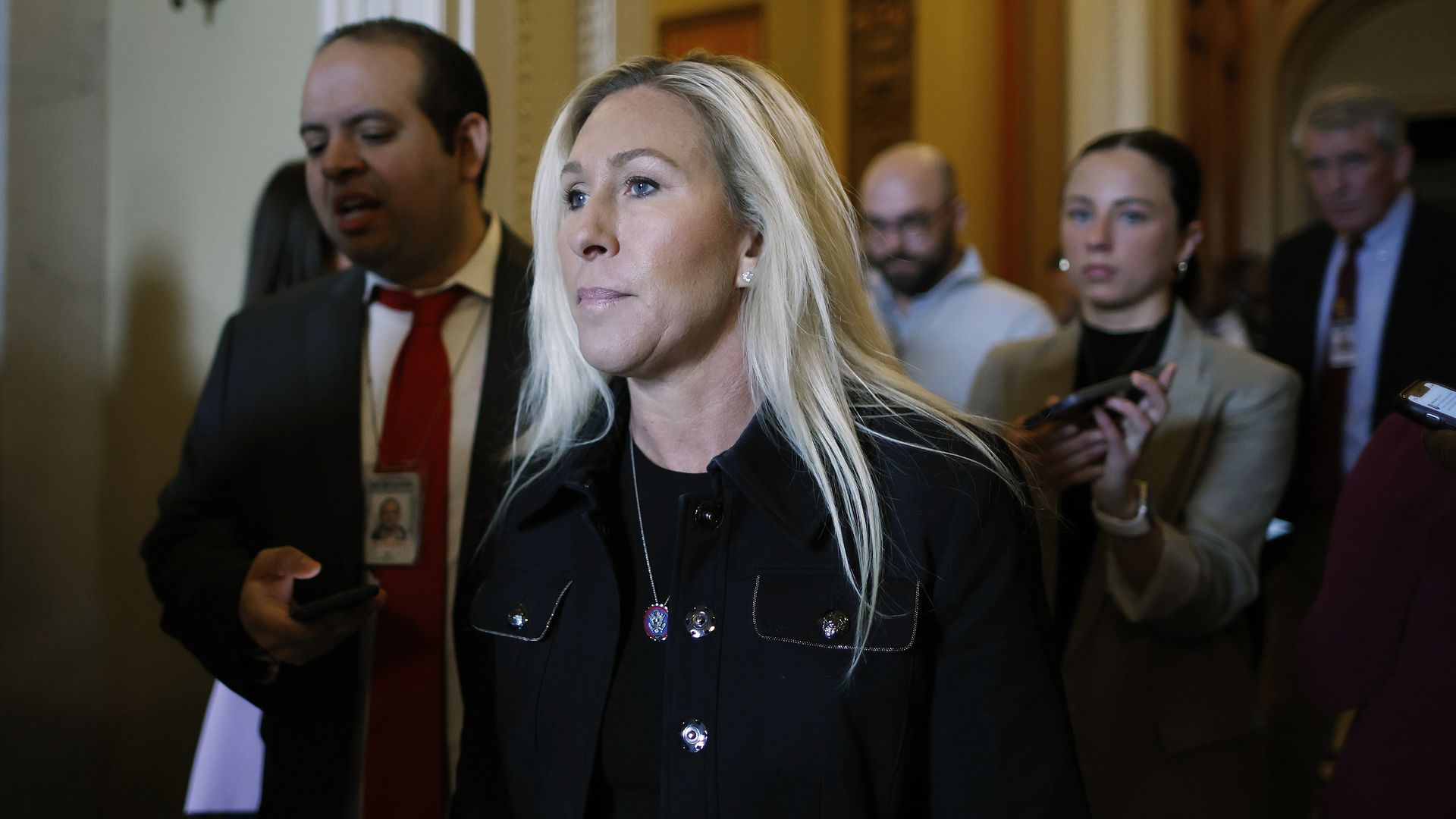 Rep. Marjorie Taylor Greene, wearing a black jacket.