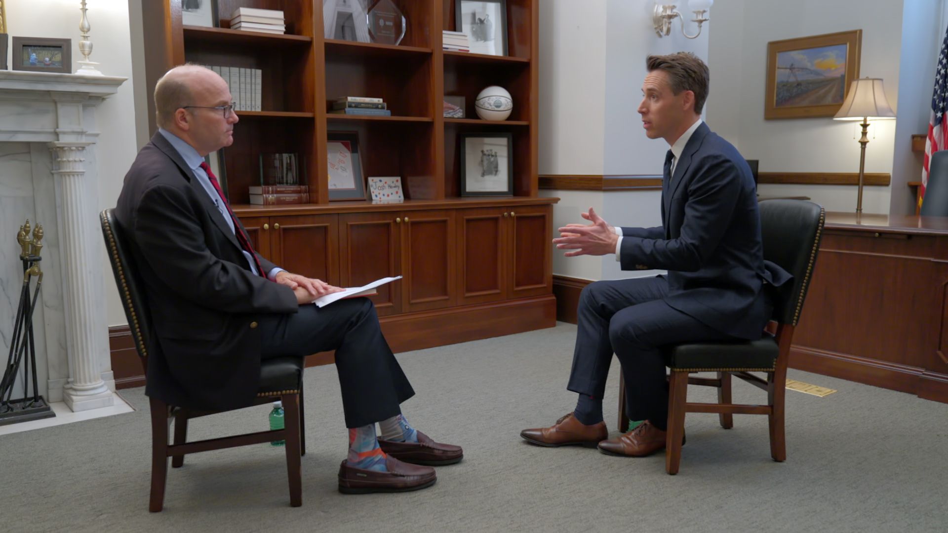Sen. Josh Hawley is seen speaking with Mike Allen during an interview for "Axios on HBO."