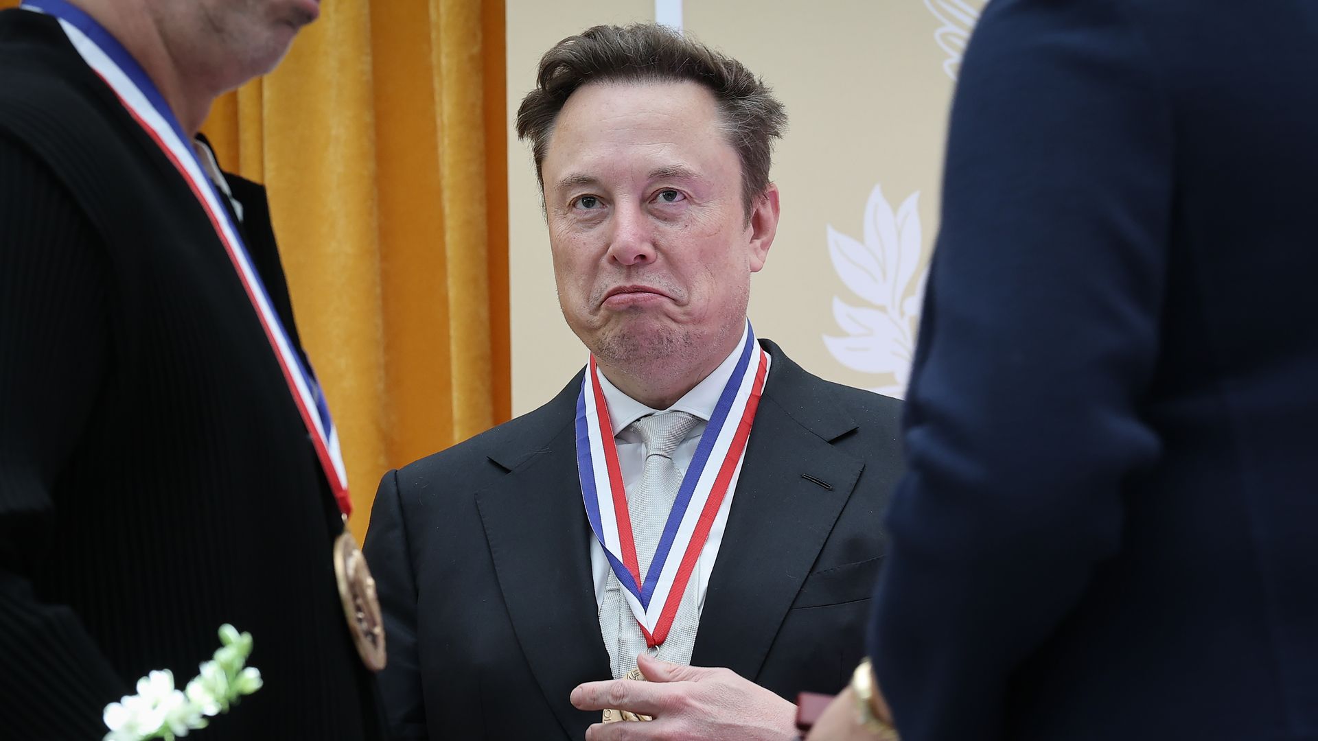 SpaceX CEO Elon Musk reacts after being awarded the National Medal of Science at the Institute of Peace on Oct. 8, 2026. 