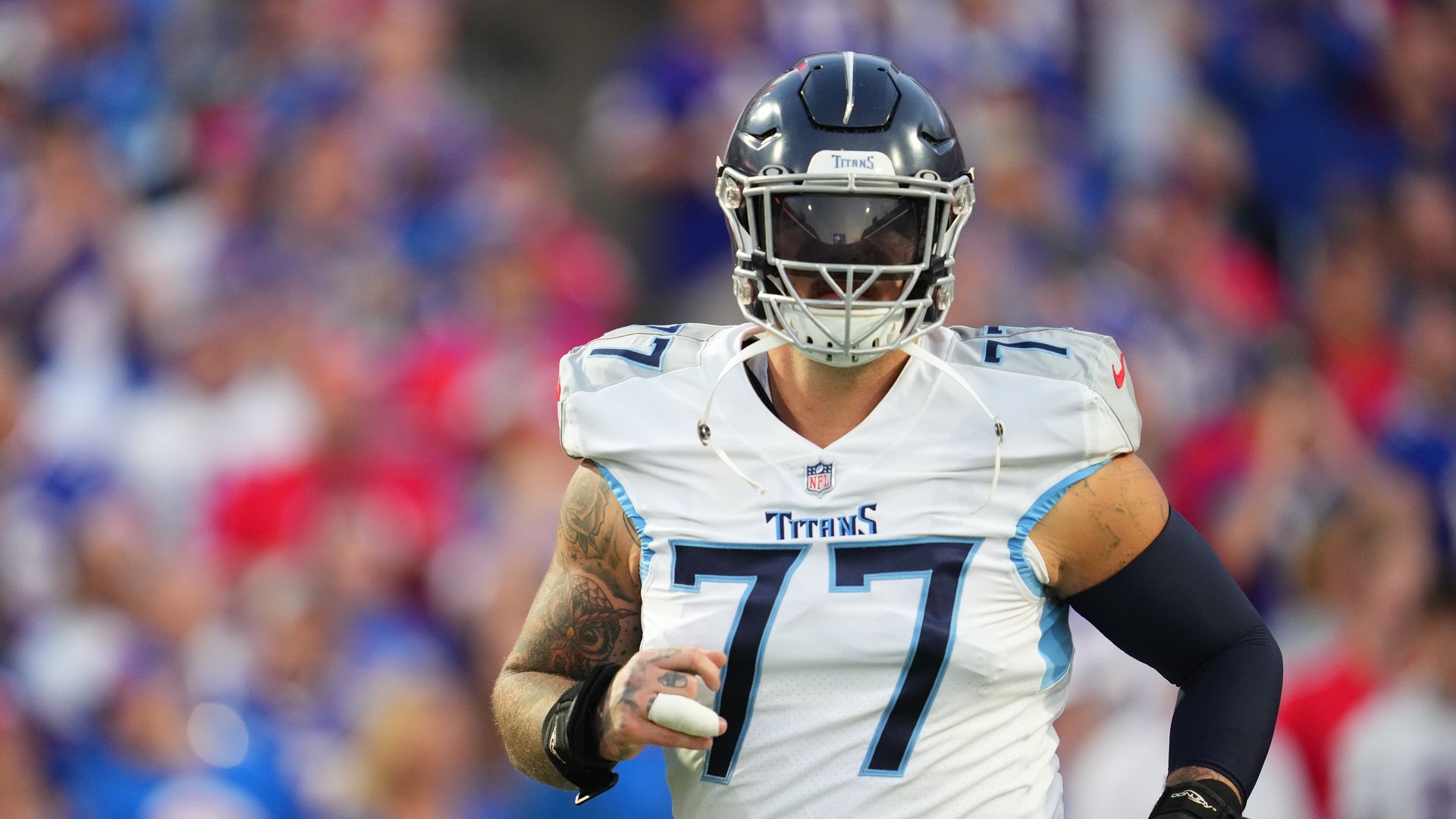 Taylor Lewan on the field during a football game.
