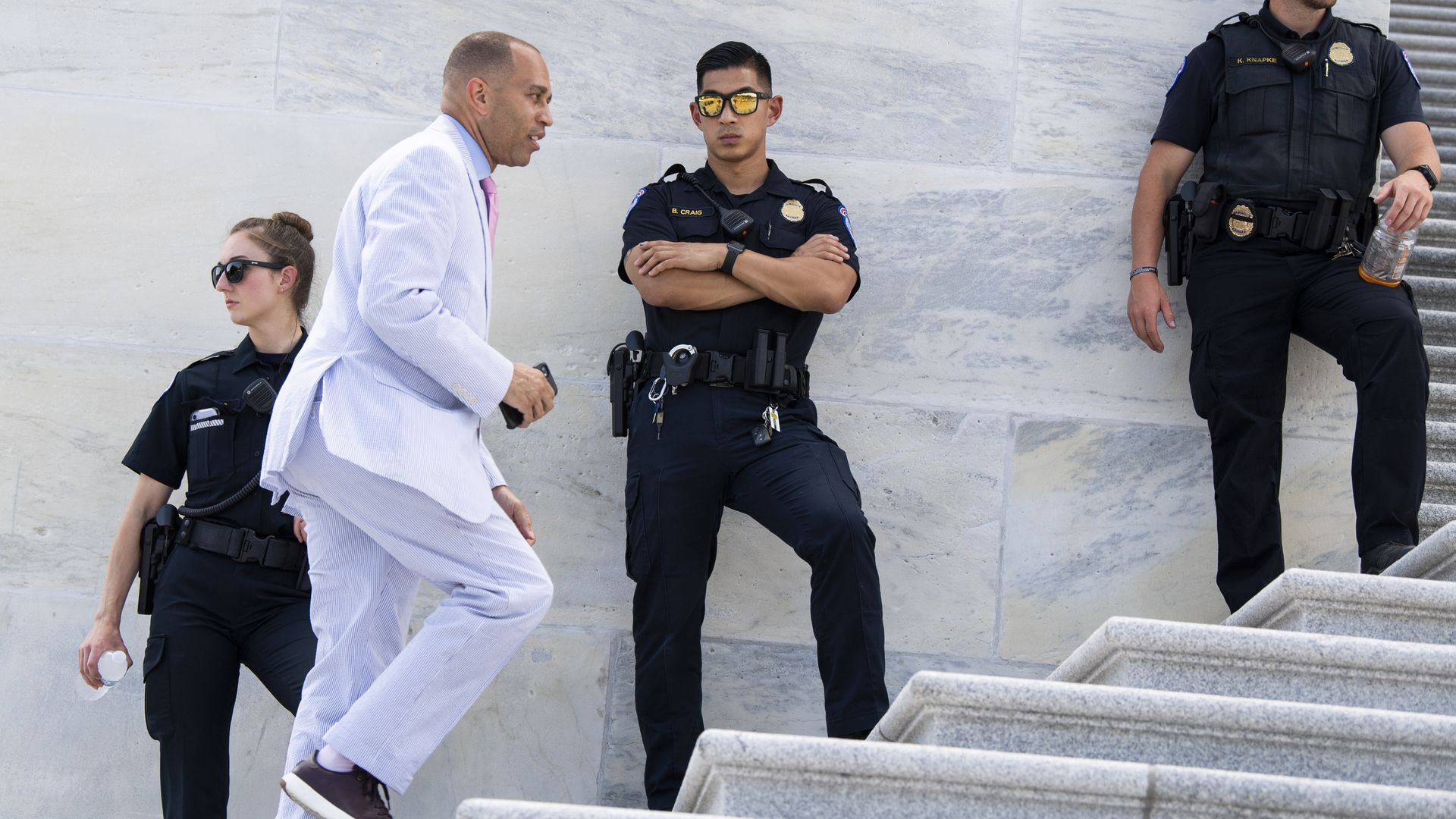 Rep. Hakeem Jeffries is seen running up the steps of the U.S. Capitol.