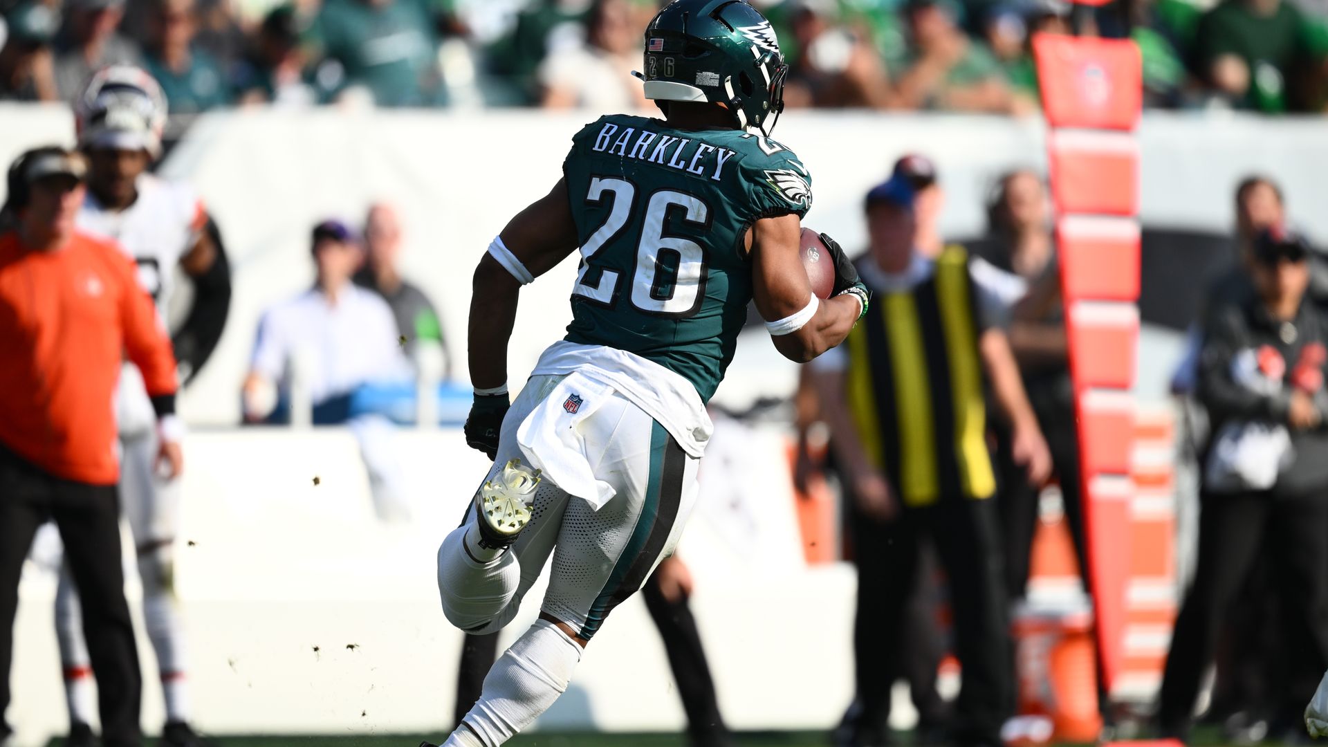 Eagles running back Saquon Barkley dashes around the field during last week's game against Cleveland.