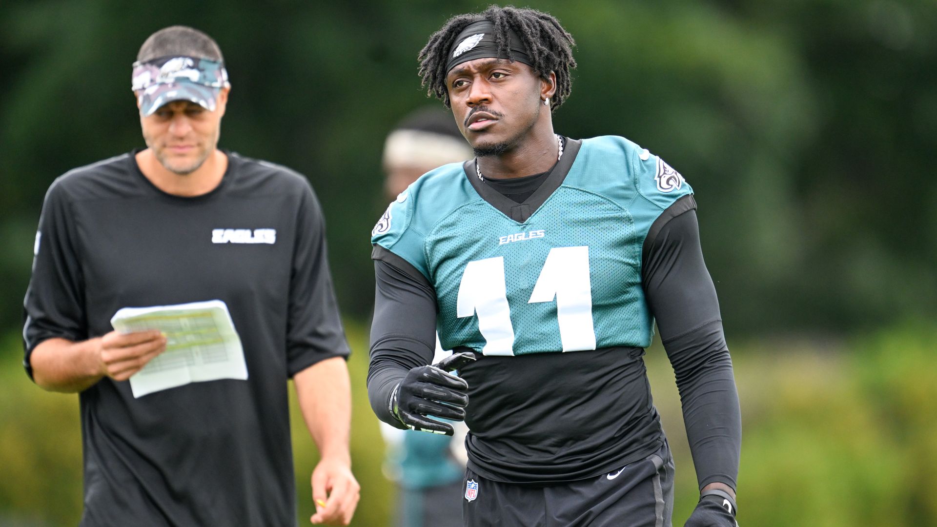 Eagles wide receiver A.J. Brown, rightt, looks on during the Philadelphia Eagles training camp.