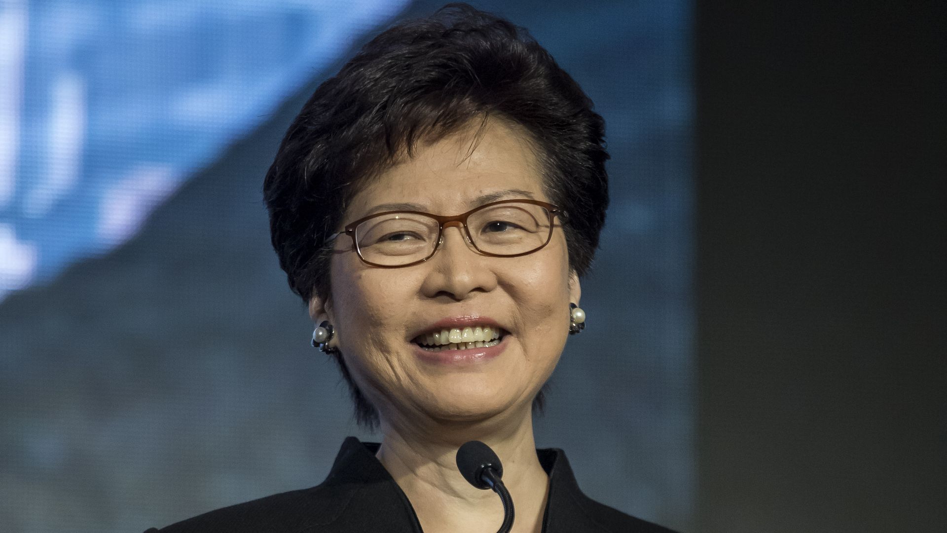 Carrie Lim executive leader of Hong Kong smiling. 