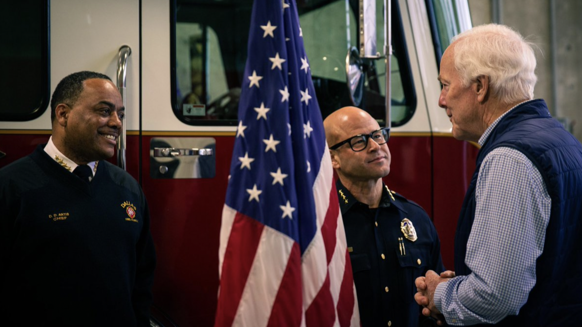 Sen. John Cornyn talking with the police and fire chiefs