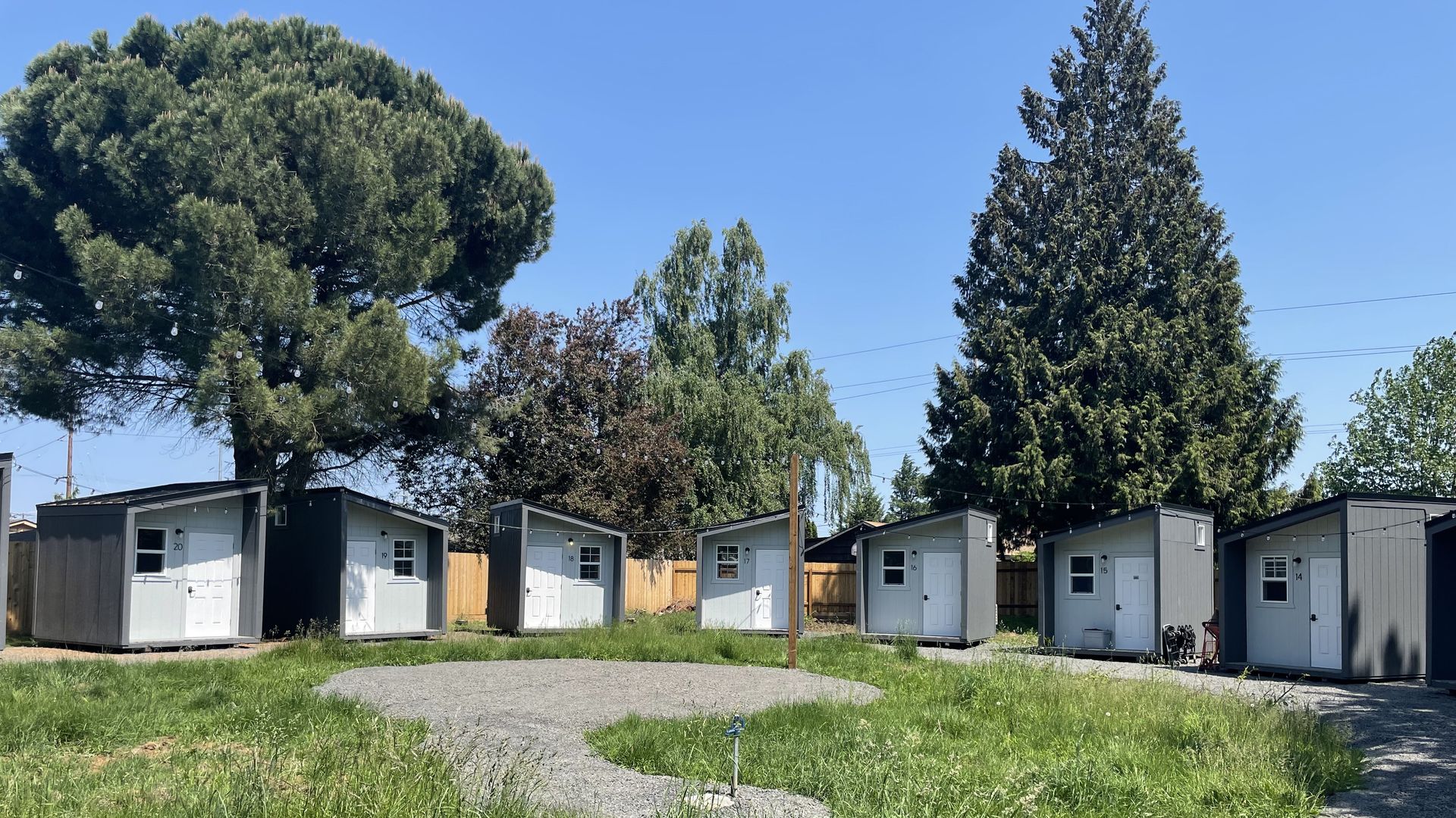 A photo of seven tiny homes part of Portland's Safe Rest Villages program.