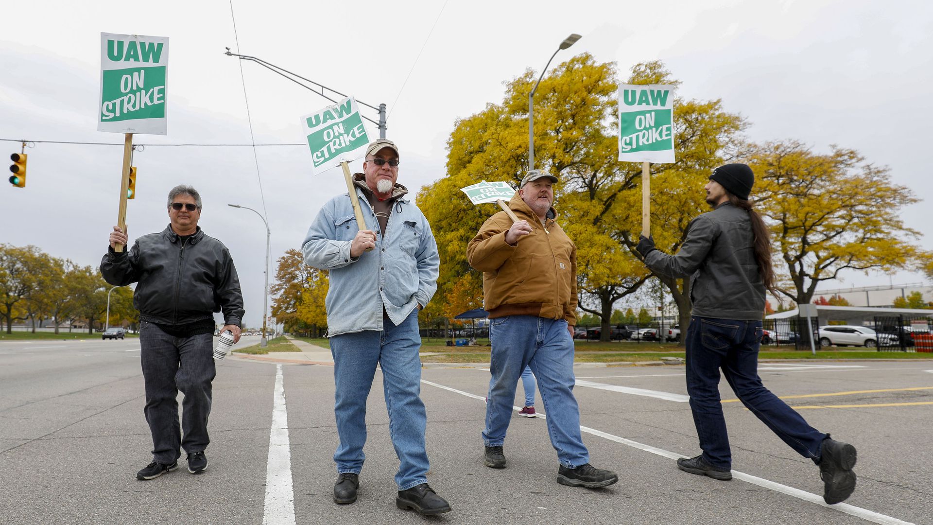 Strikers form a picket line.