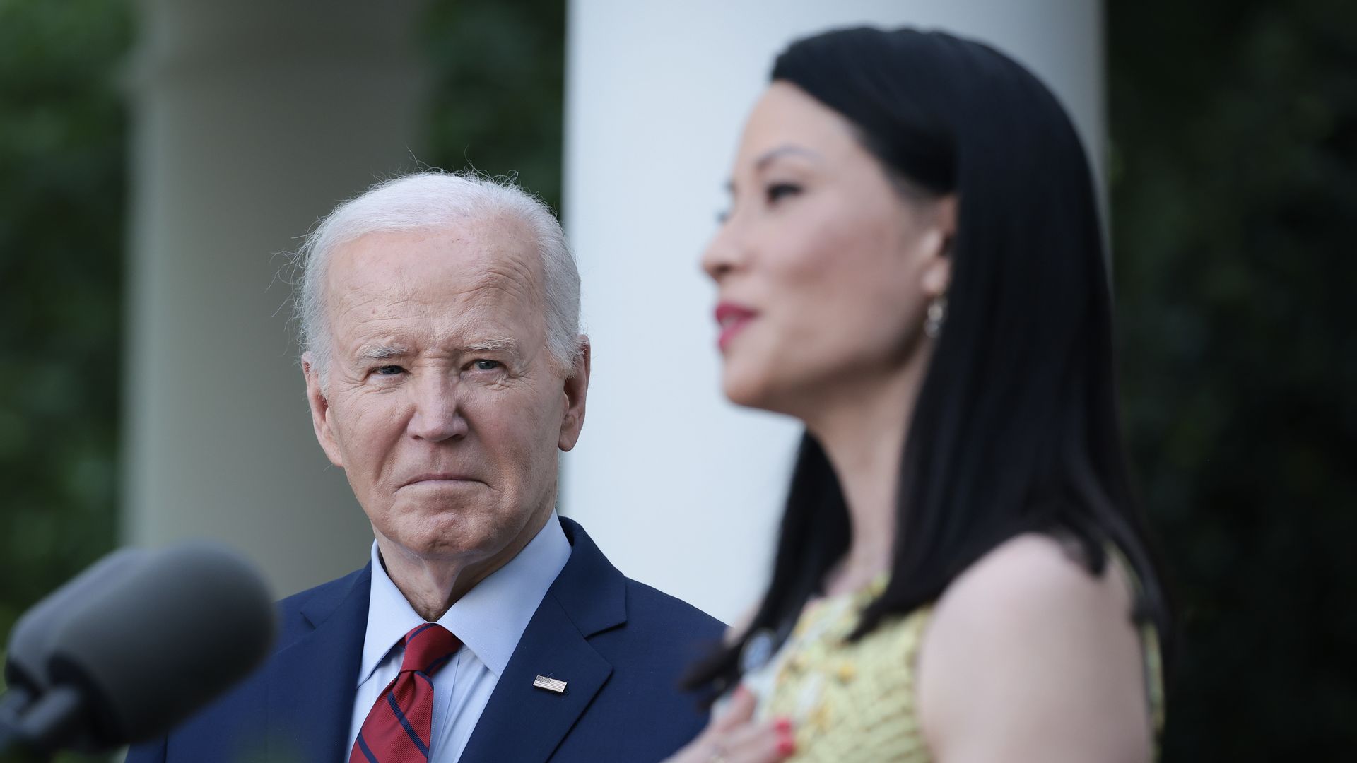 Actress Lucy Liu speaks during an event with U.S. President Joe Biden celebrating Asian American, Native Hawaiian, and Pacific Islander Heritage Month in the Rose Garden of the White House May 13, 2024 in Washington