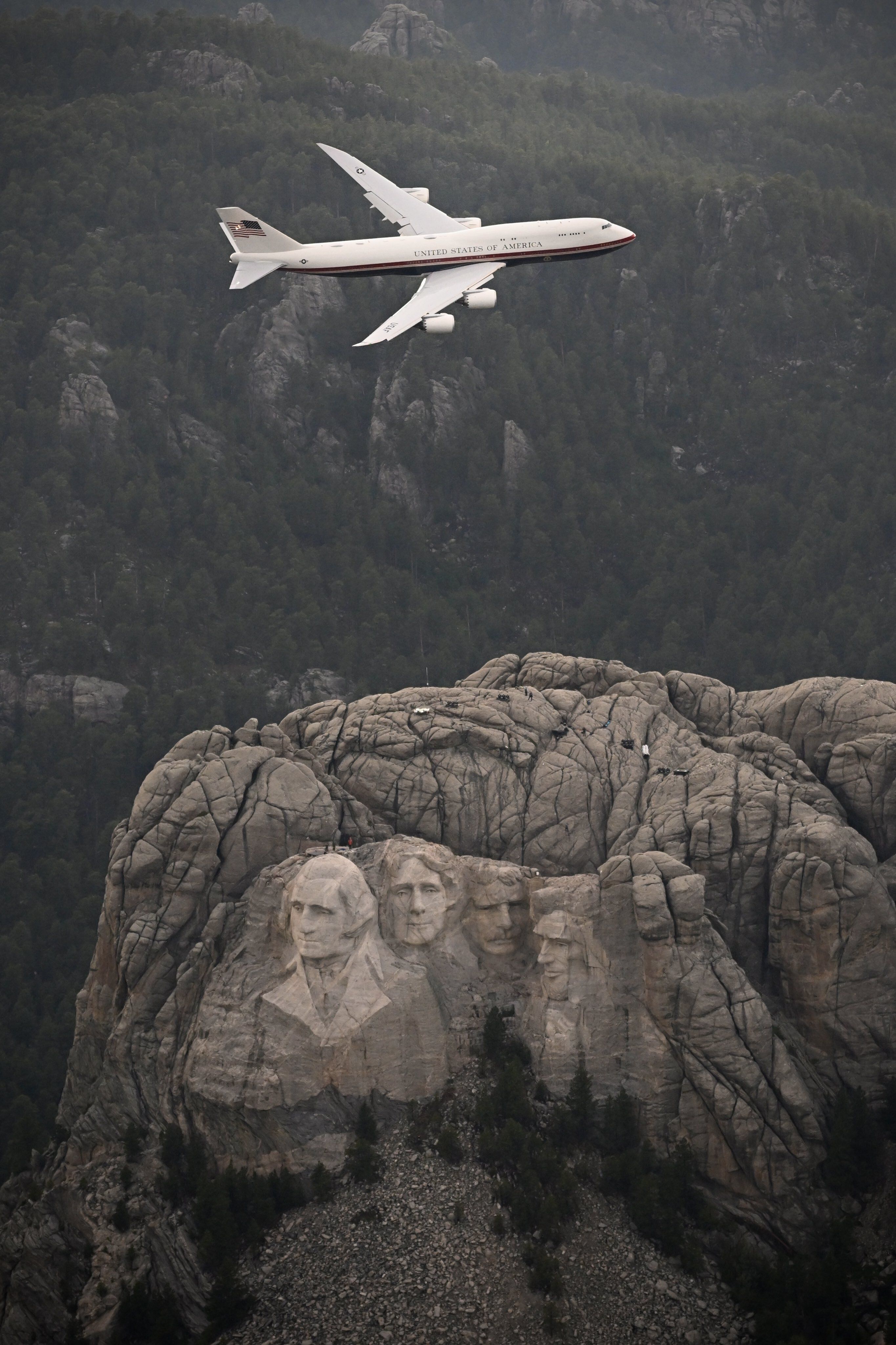 President Trump flies over Mount Rushmore aboard the new Air Force One on Friday.