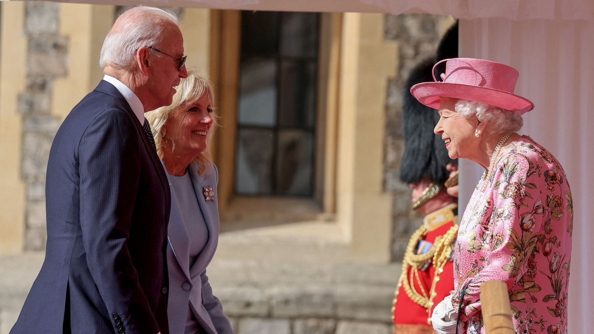 President Biden and first lady Jill Biden are seen greeting Queen Elizabeth II at Windsor Castle.