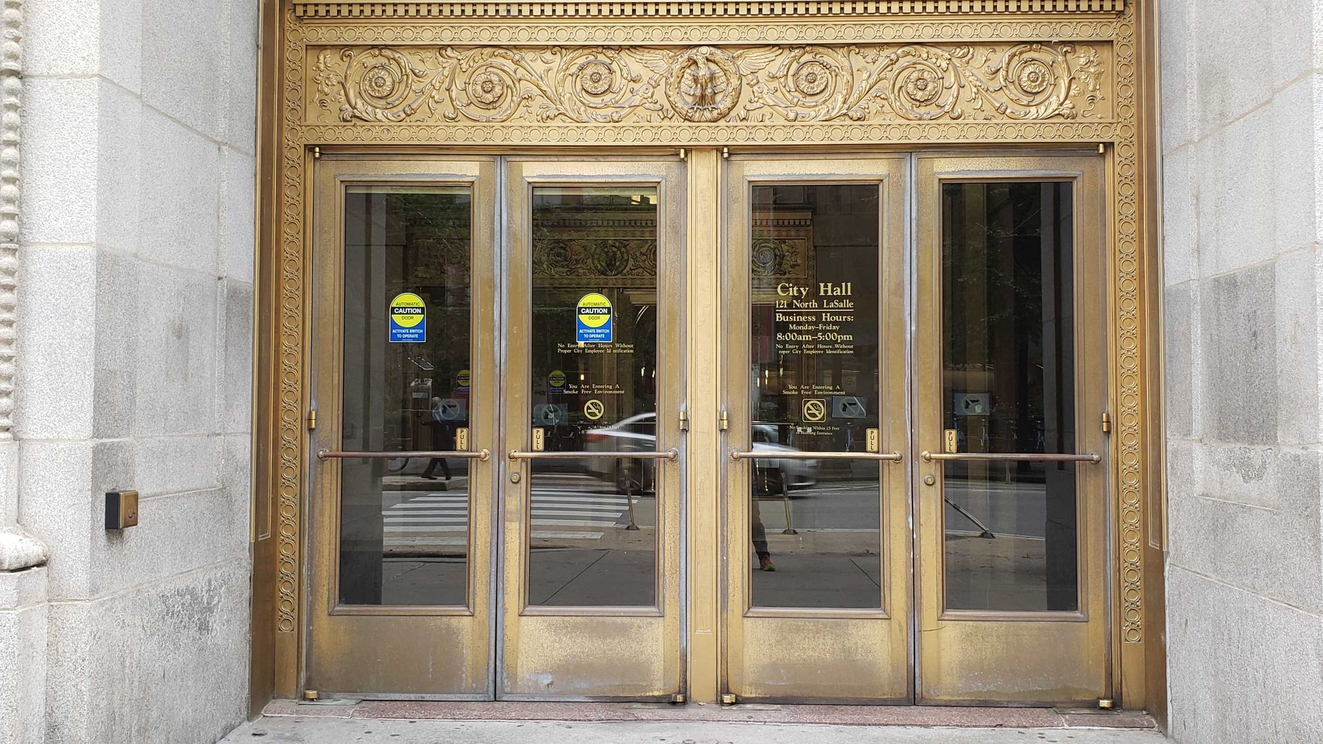 A photo of the doors at City Hall. 