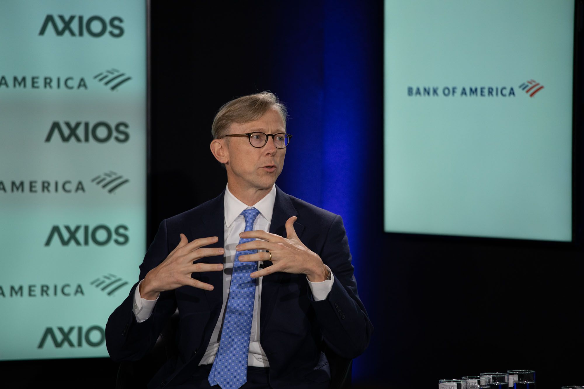 Brian Hook in conversation on the Axios stage with Mike Allen. 
