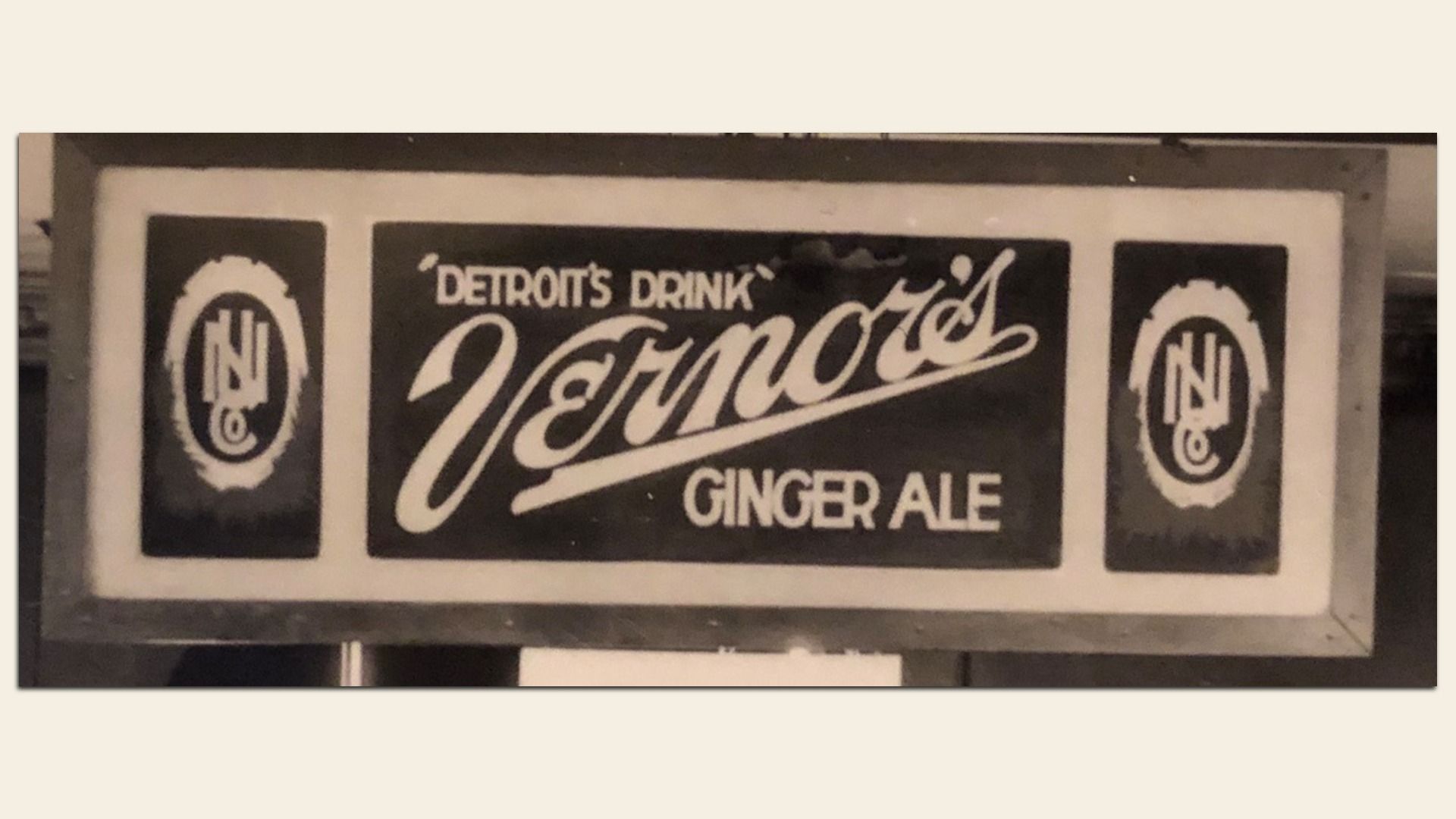 A vintage Vernors sign.
