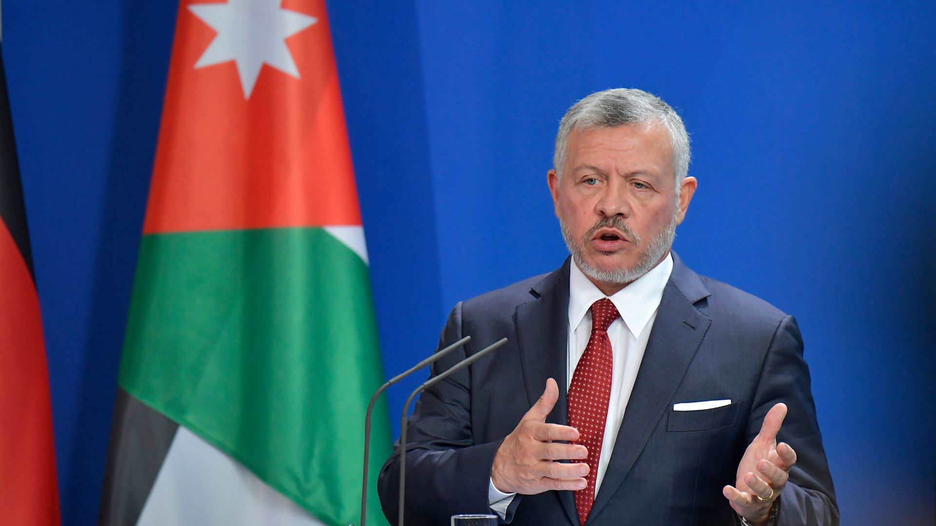 King Abdullah II of Jordan gives a joint press conference with the German Chancellor.