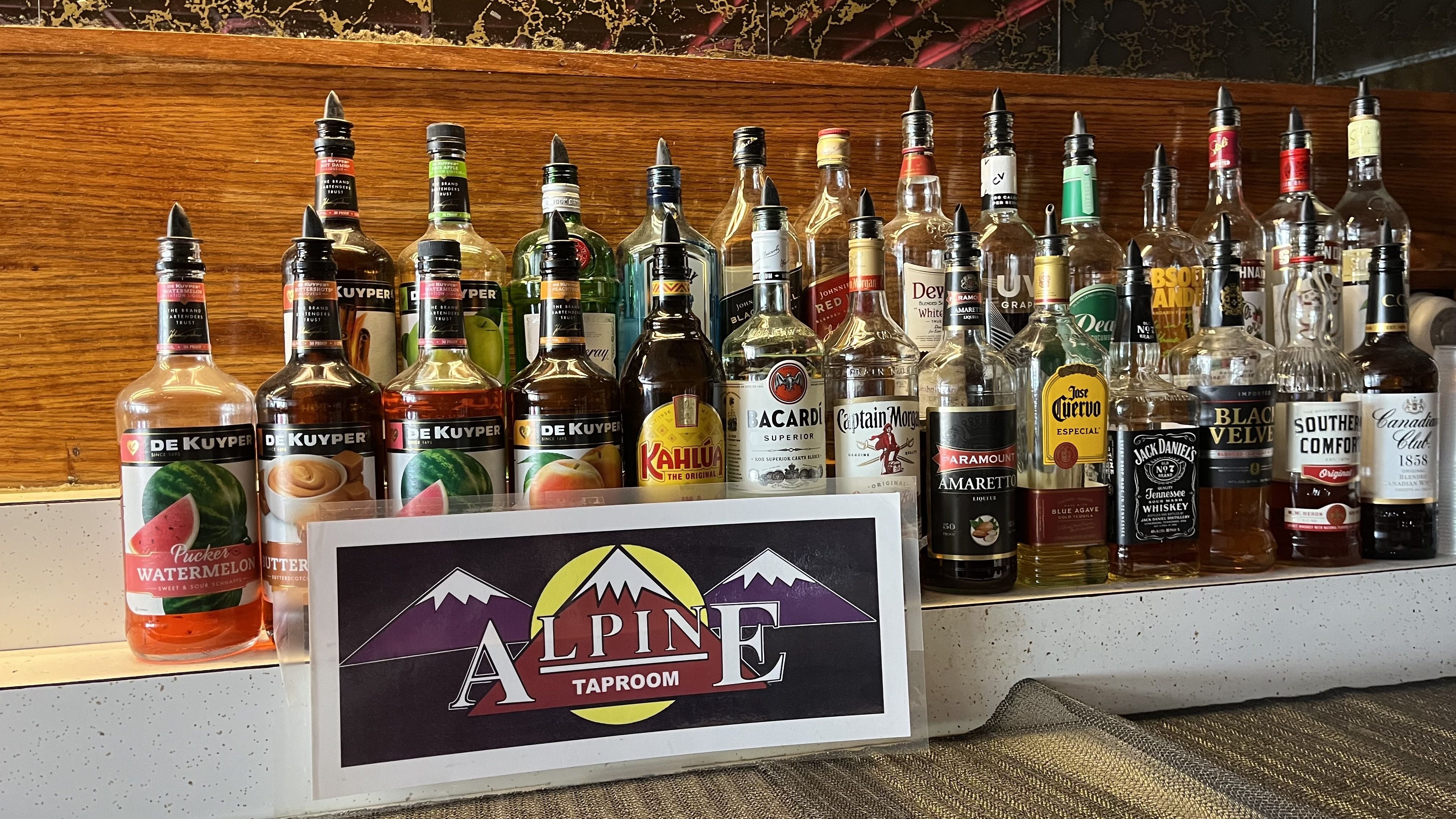 Liquor and an Alpine Taproom sign