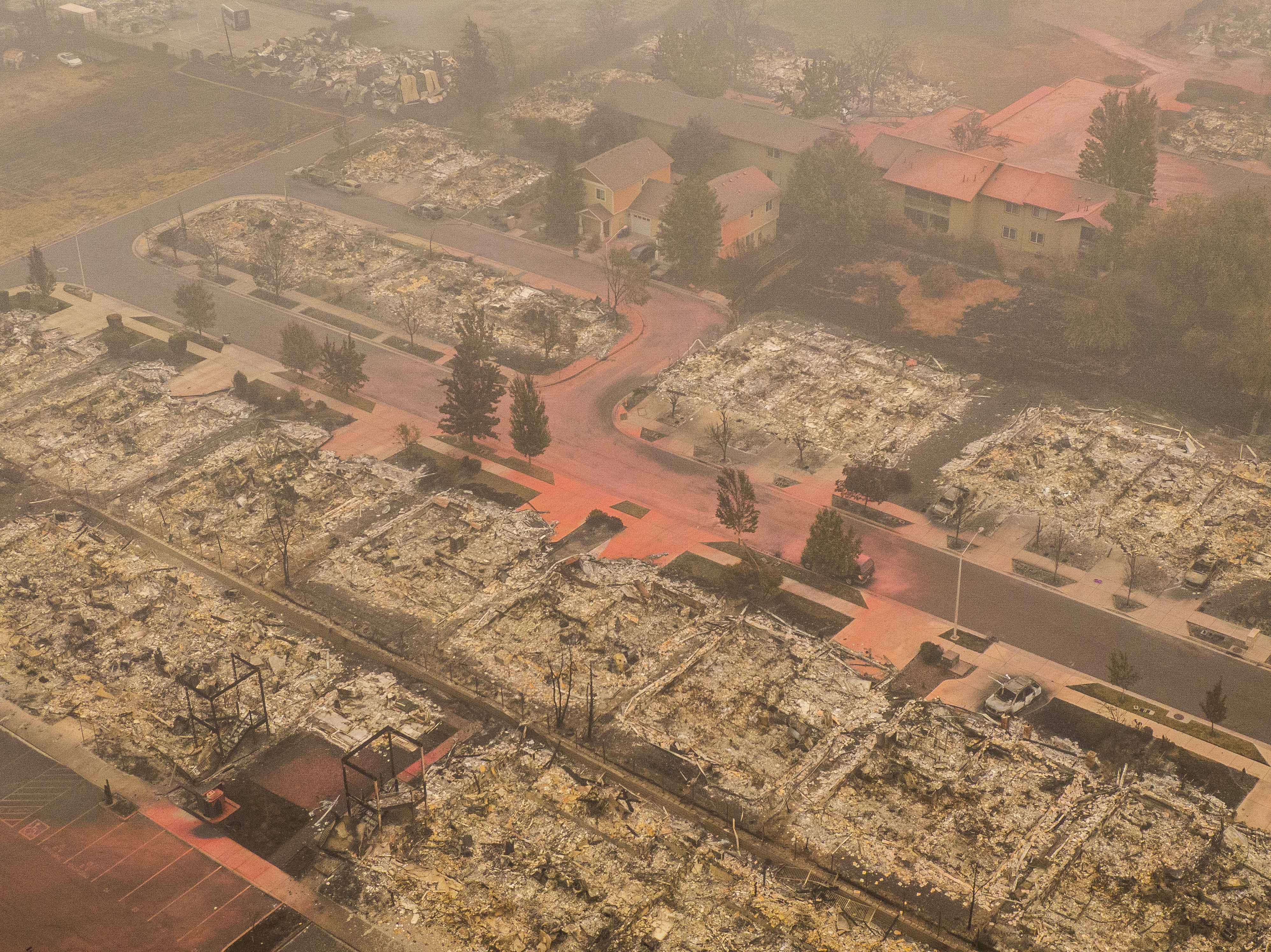 In this aerial view from a drone, homes destroyed by wildfire are seen on September 12, 2020 in Talent, Oregon. Hundreds of homes in Talent and nearby towns have been lost due to wildfire.
