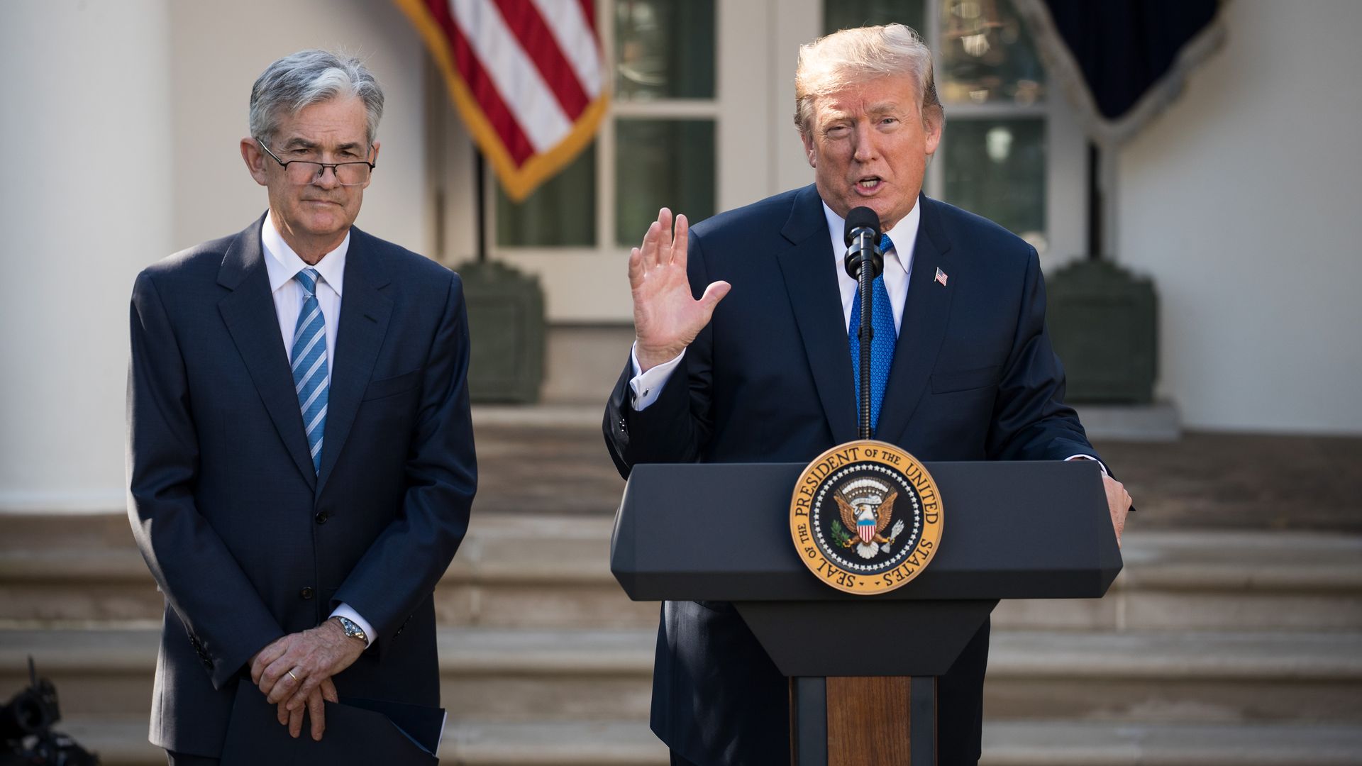Donald TRump and Jay Powell