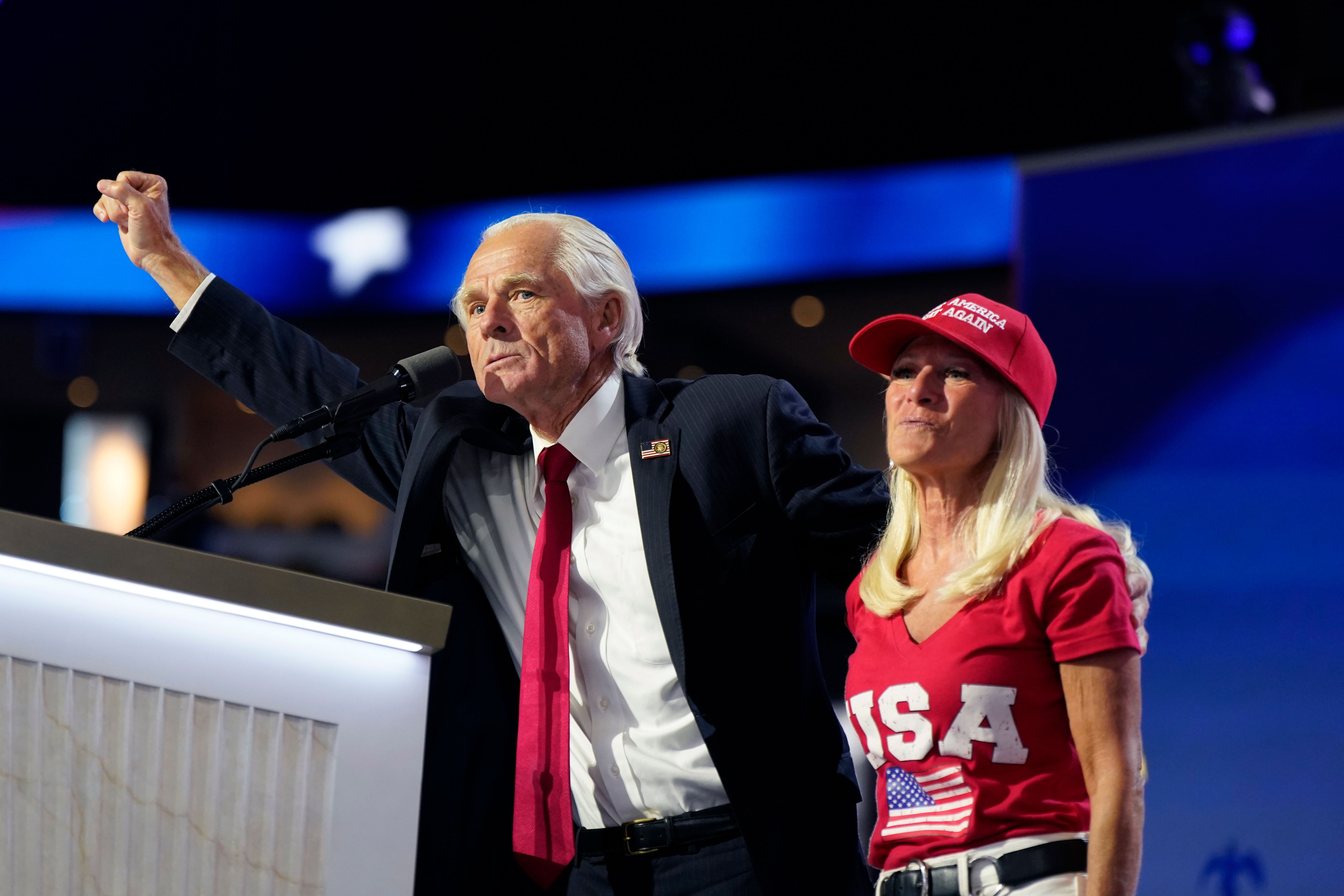 Peter Navarro, former White House trade adviser, left, and "Wife Bonnie" during the Republican National Convention (RNC) at the Fiserv Forum in Milwaukee.