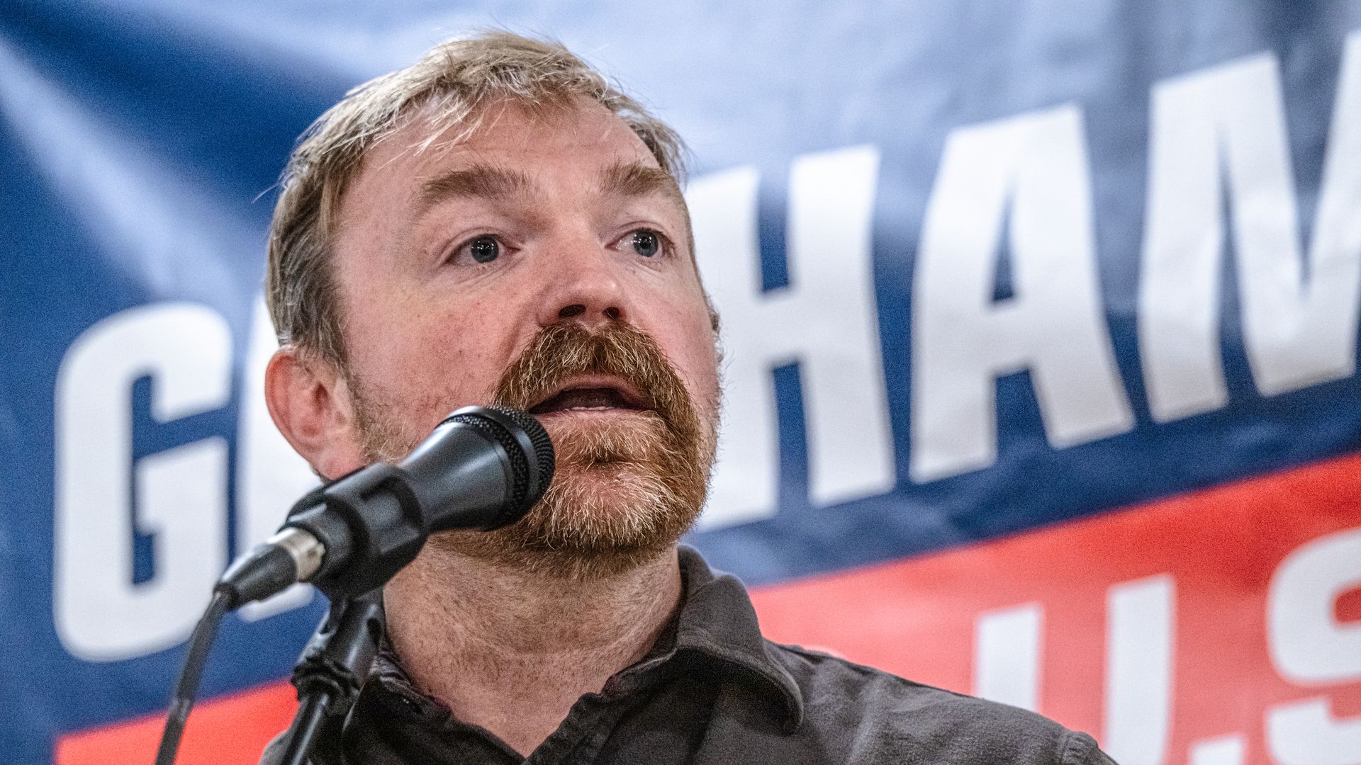 Graham Platner speaks to voters at a town hall at the Elks Lodge 188 on June 7 in Portland, Maine. 